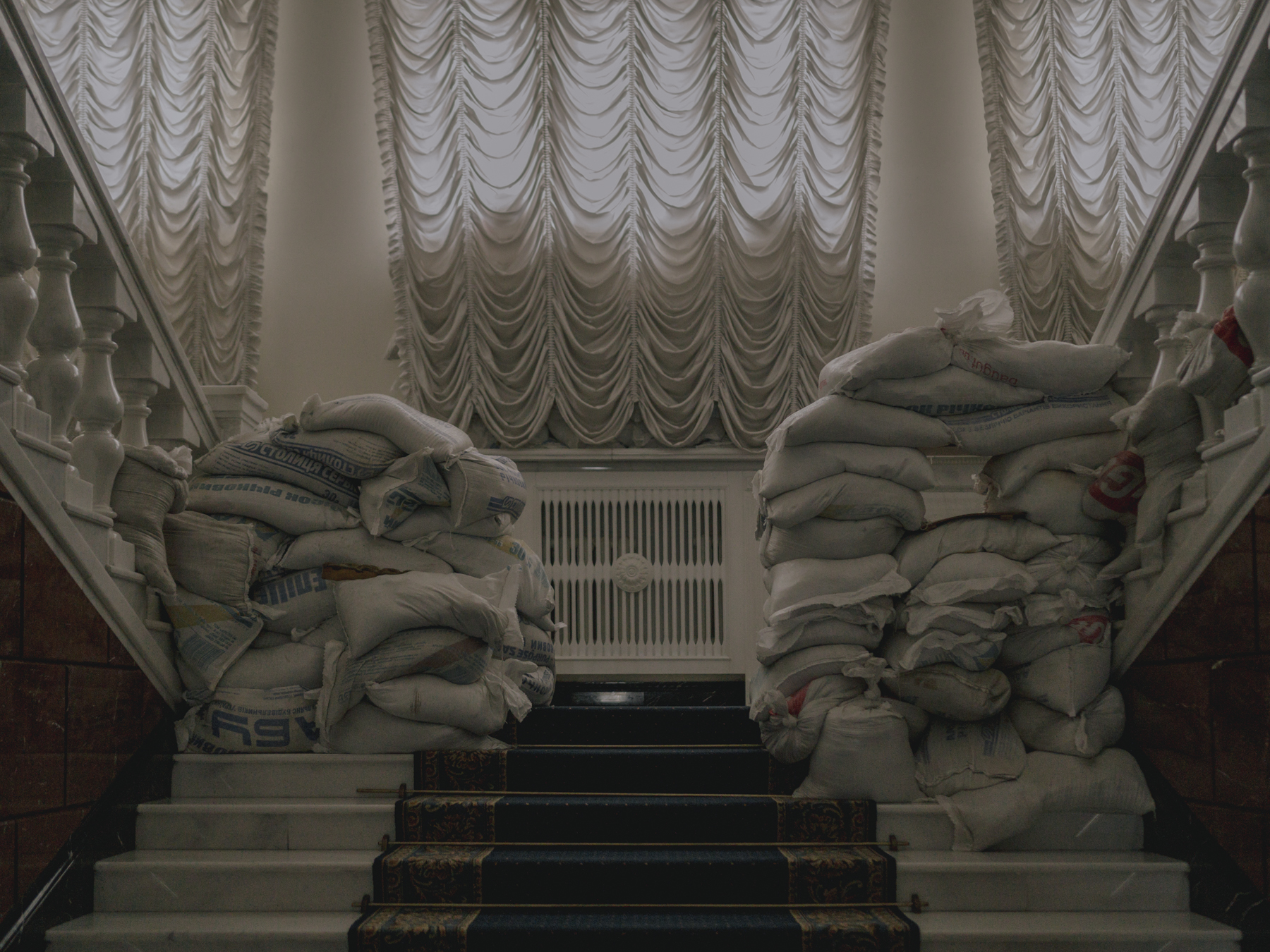 Sandbags on the stairs of the Ukrainian presidential office. Members of the government are top targets of Russia's war of aggression, which can put a great burden on family circumstance. Kyiv, 29.11.2022.