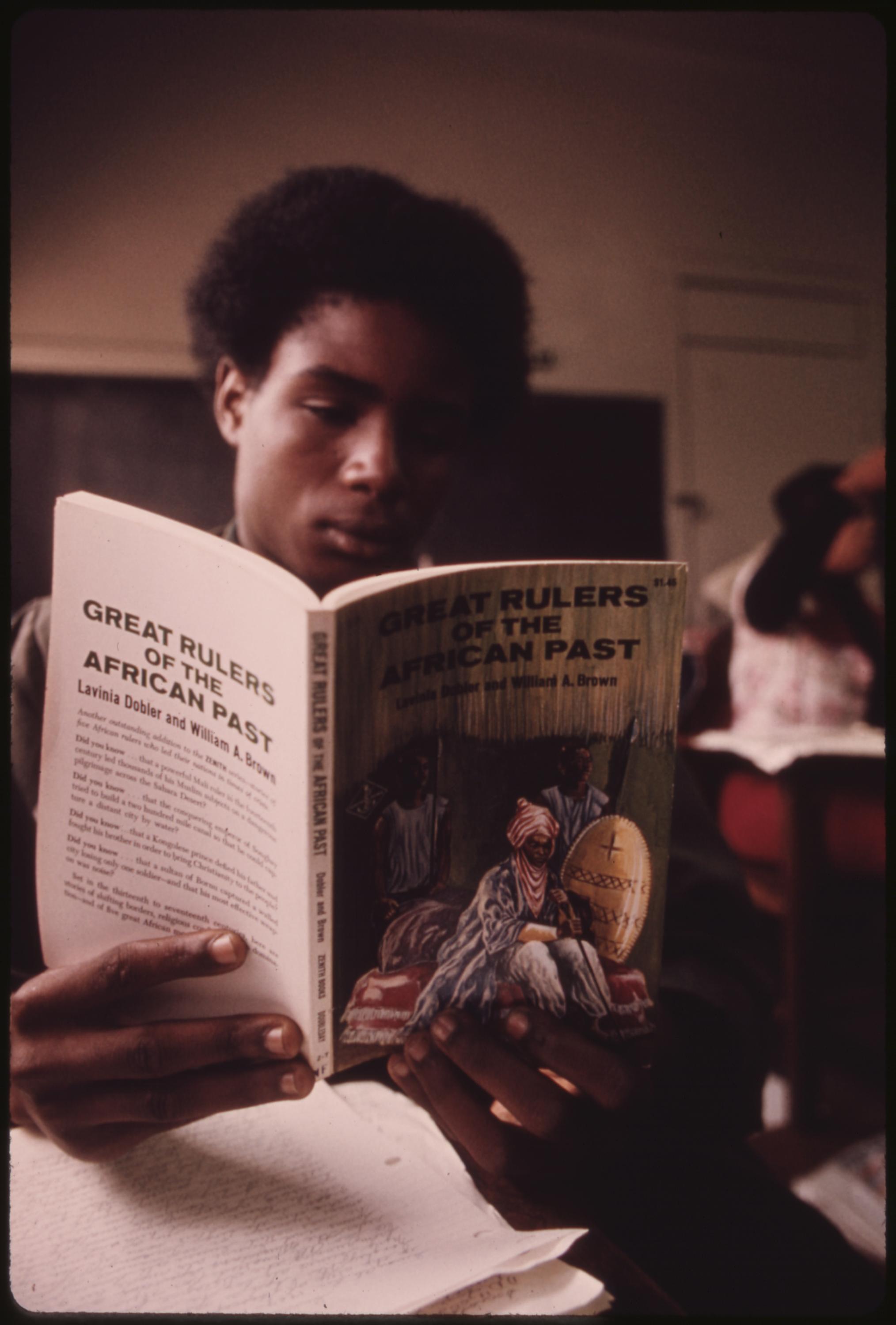 Black student in a Black studies class in a West Side Chicago classroom reading a book about “Great Rulers in Africa’s Past.” Recent years have seen a resurgence by various minorities of their histories. Pride in their heritage has led to continuing traditions and aspects of their culture, which are unique in American tradition, October 1973.