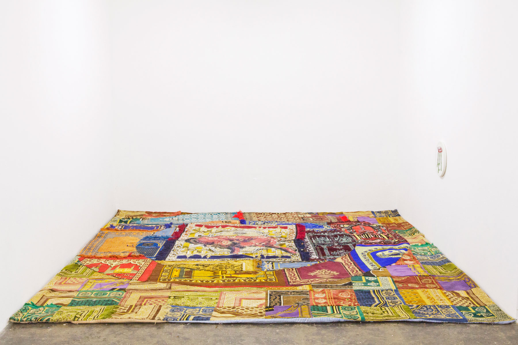 Igshaan Adams, If that I knew (2013) | Quilted prayer carpets and embroidered element, dimensions variable (carpet 366 x 320cm)