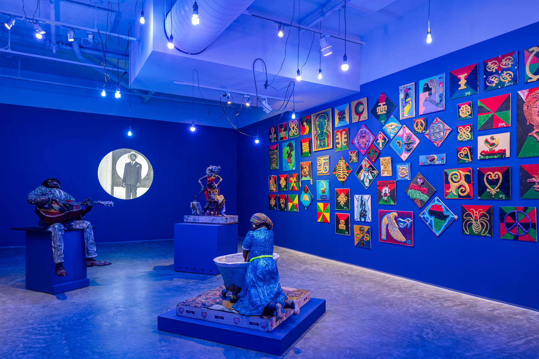   "The Museum of the African's Experience in America," installation view of blue gallery.