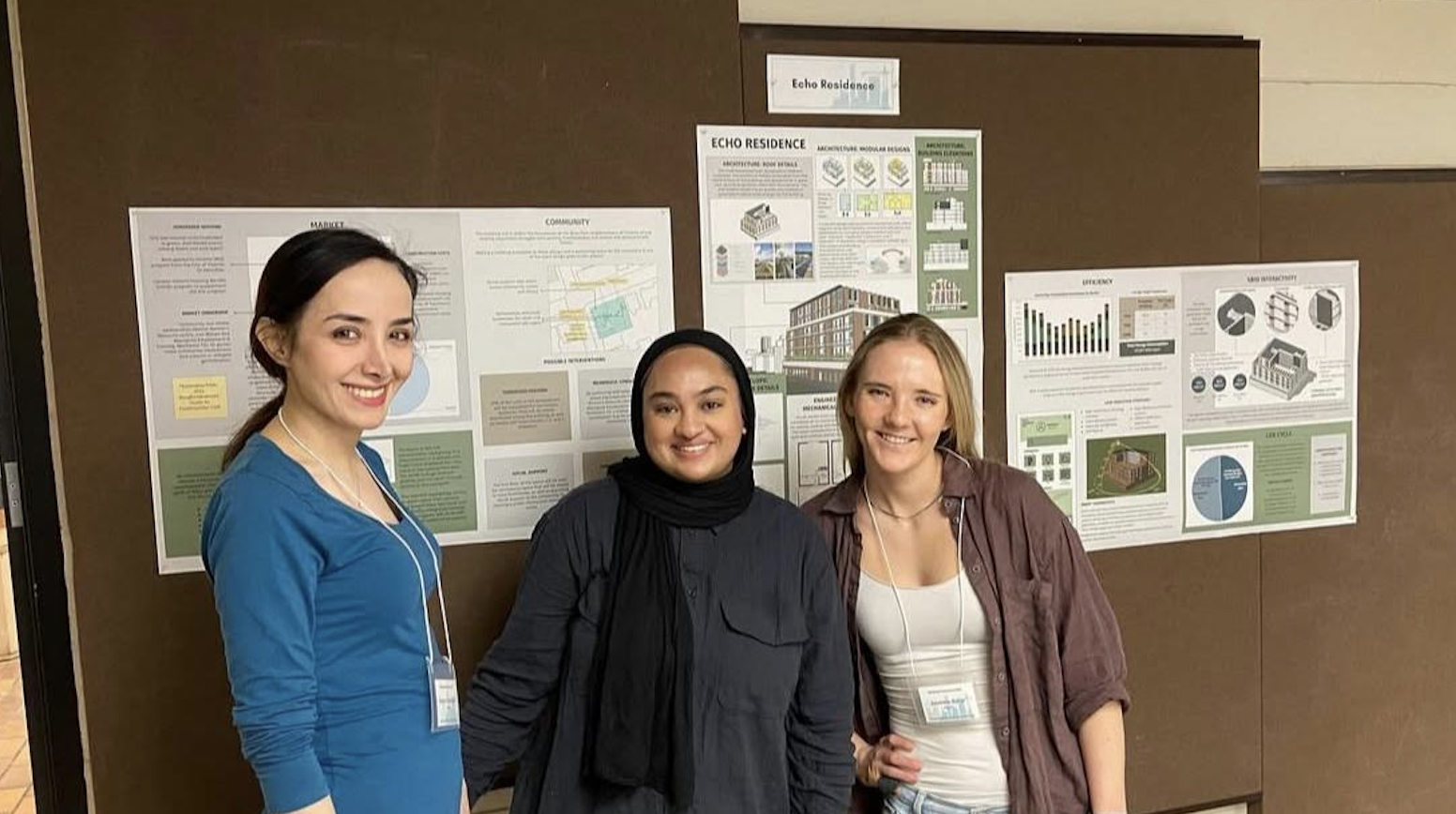 From left to right, Arezou Ahmadlou, Nafisa Ahmed, and myself in front of our presentation for the Solar Decathlon Building Symposium.