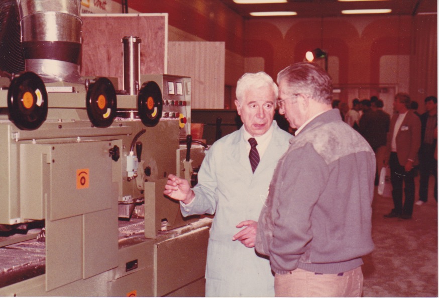 Bert on the showroom floor with a client, giving a demonstration.
