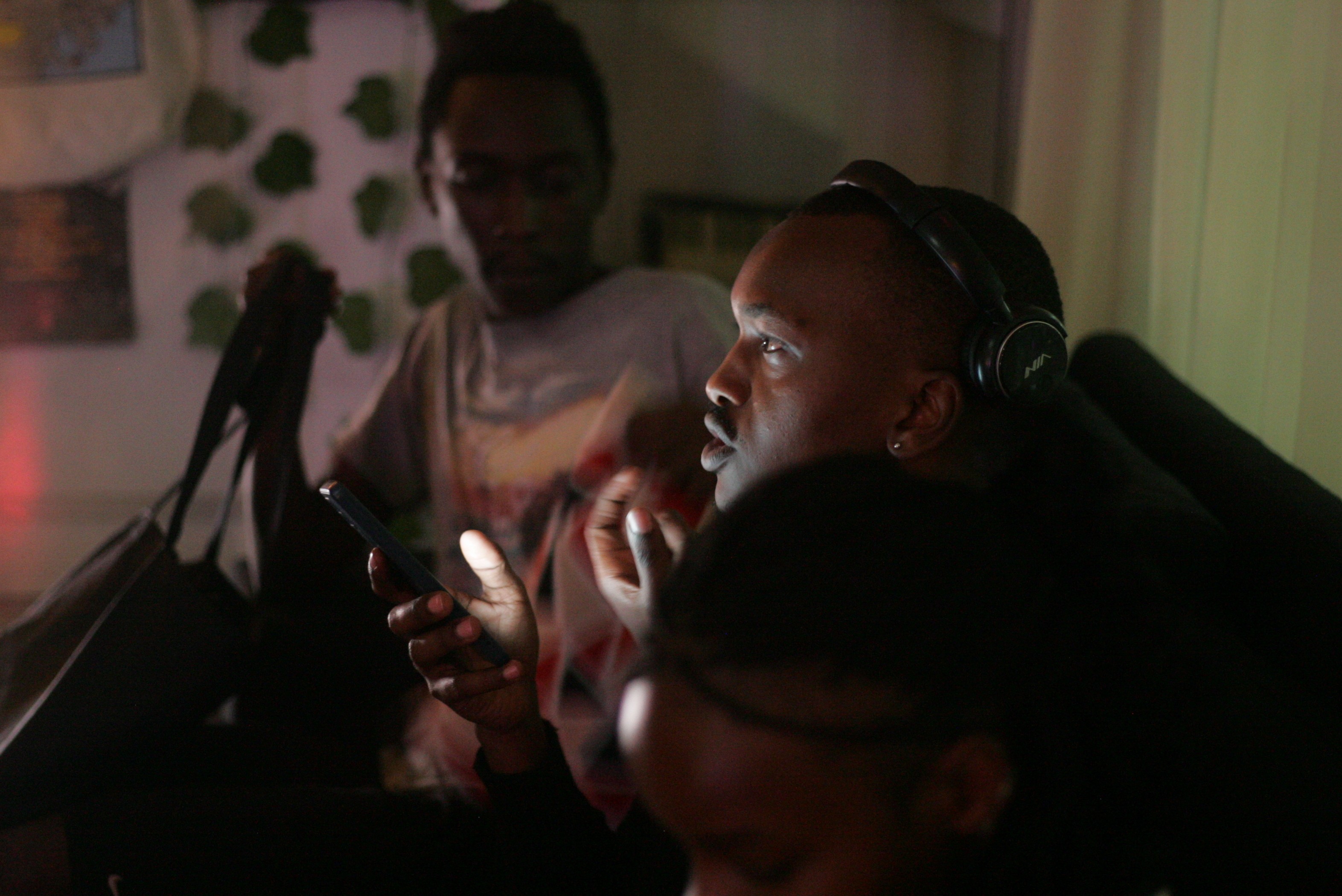 Ndung'u Mbithi, a Conflux instructor, participating live from their phone at the Santuri Salon during the ARC: CONFLUX.