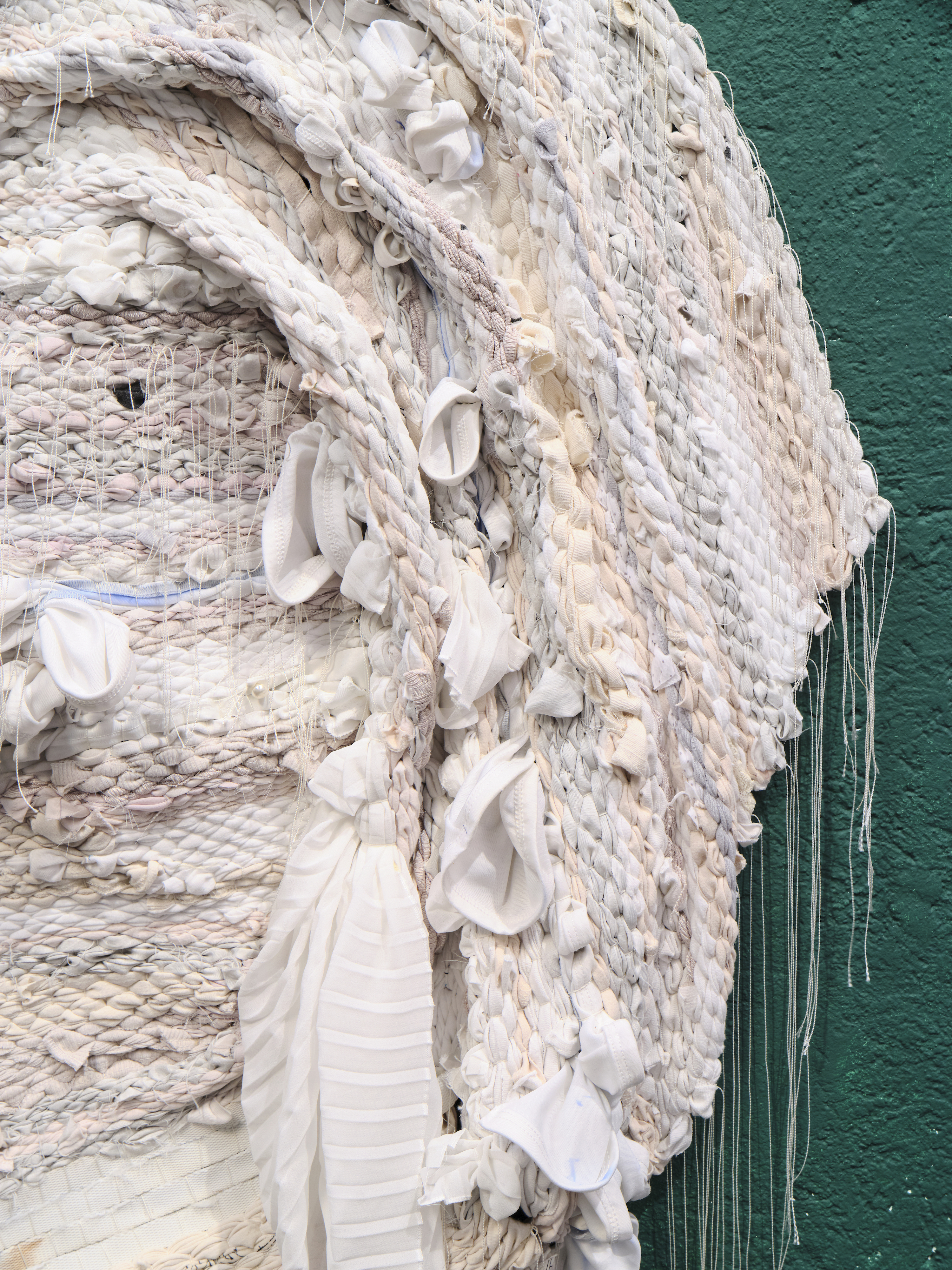 Cassandra Mayela, detail view, Margarita, 2022, collected and repurposed, woven clothing, 37 x 28 in / 94 × 71 cm © Cassandra Mayela