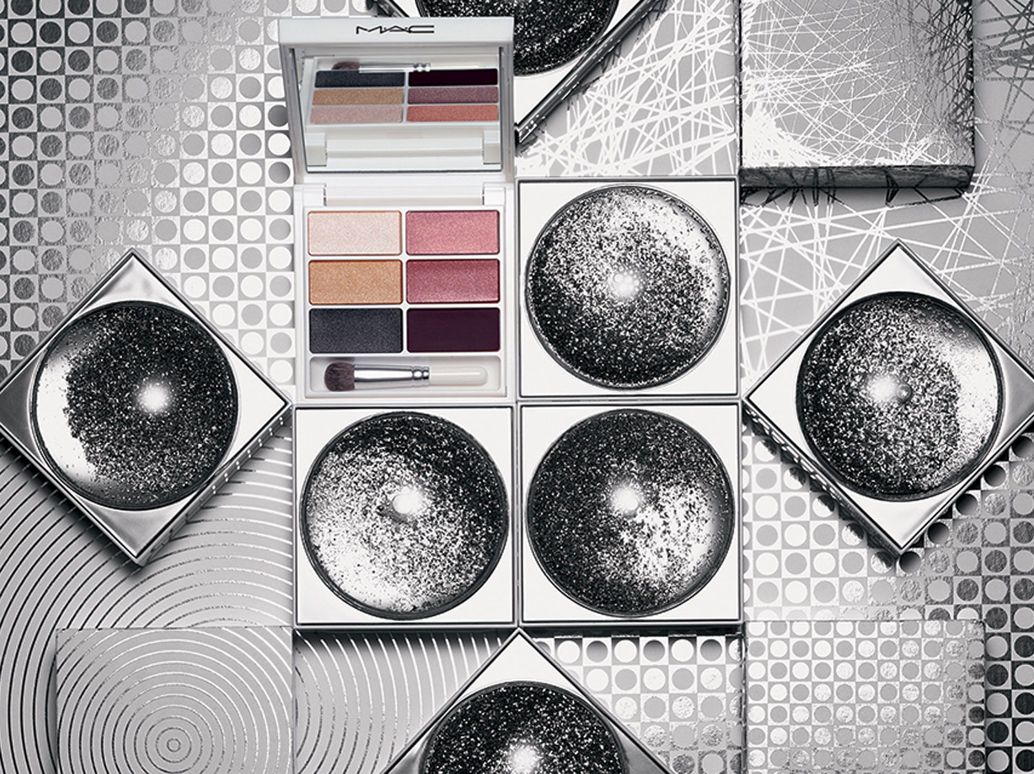 Holiday 2011 eye and face compacts with working snow globe deco plaque