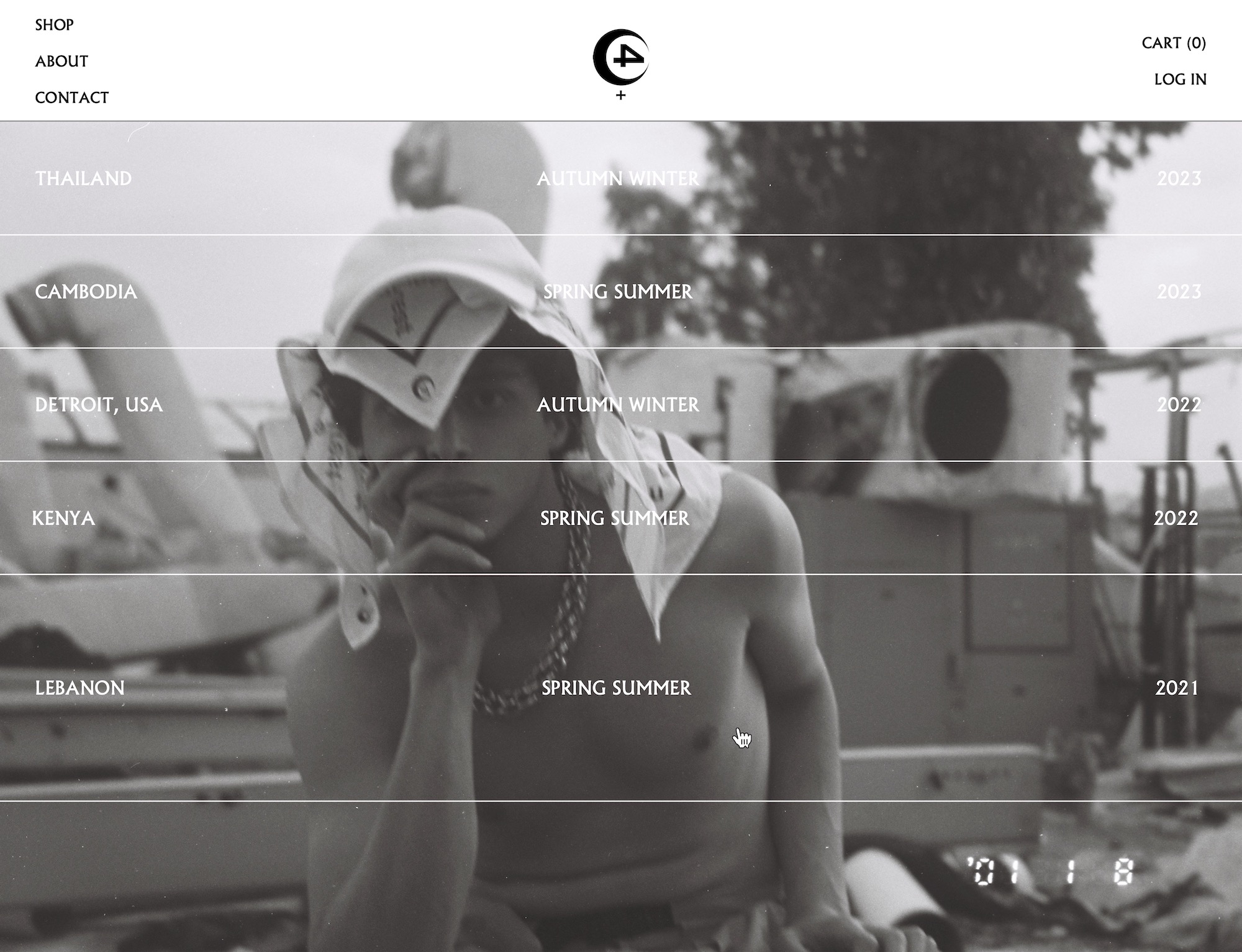 HOVERING OVER A COLLECTION WOULD COLOR INVERT THE LINES AND THE TEXT TO WHITE. AND THE COVER IMAGE/VIDEO FOR THE SELECTED COLLECTION WOULD APPEAR AS THE BACKGROUND.