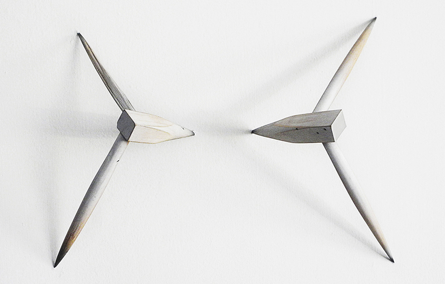 Astilla / Intervened chair fragments installed on a wall / 2012