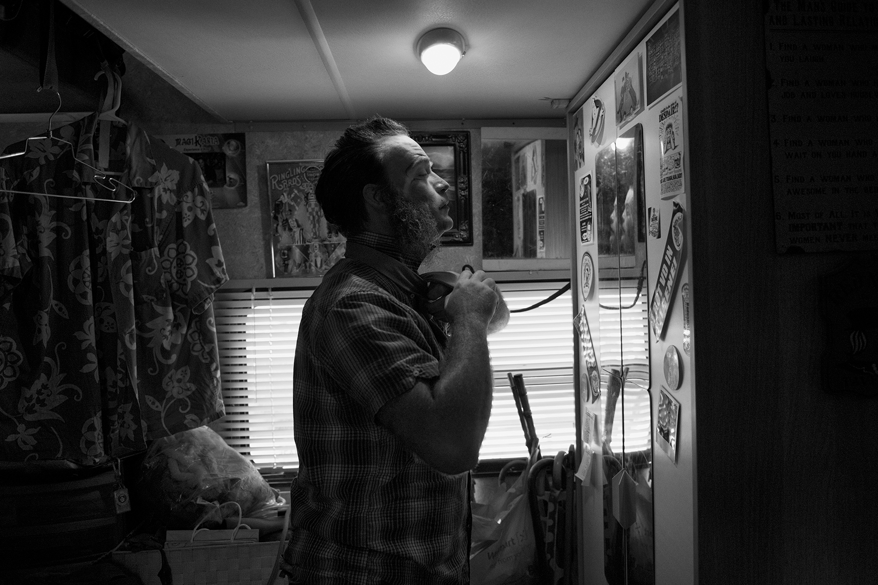 Leo the Clown prepares for the act in his trailer.