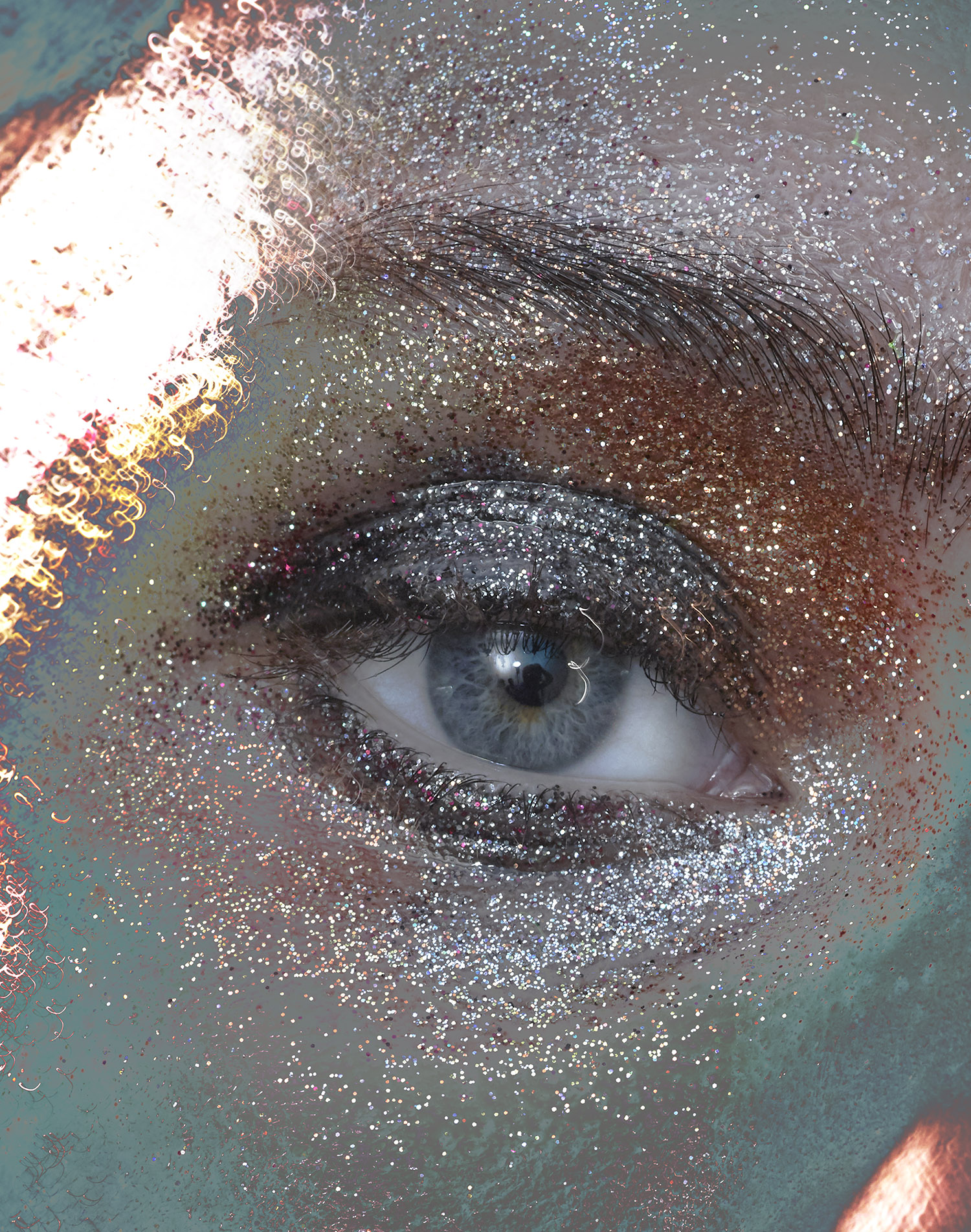 KMA photographer Daniel Schweizer shoots a closeup photo of a woman with blue eyes with glitter all over her face and eyes