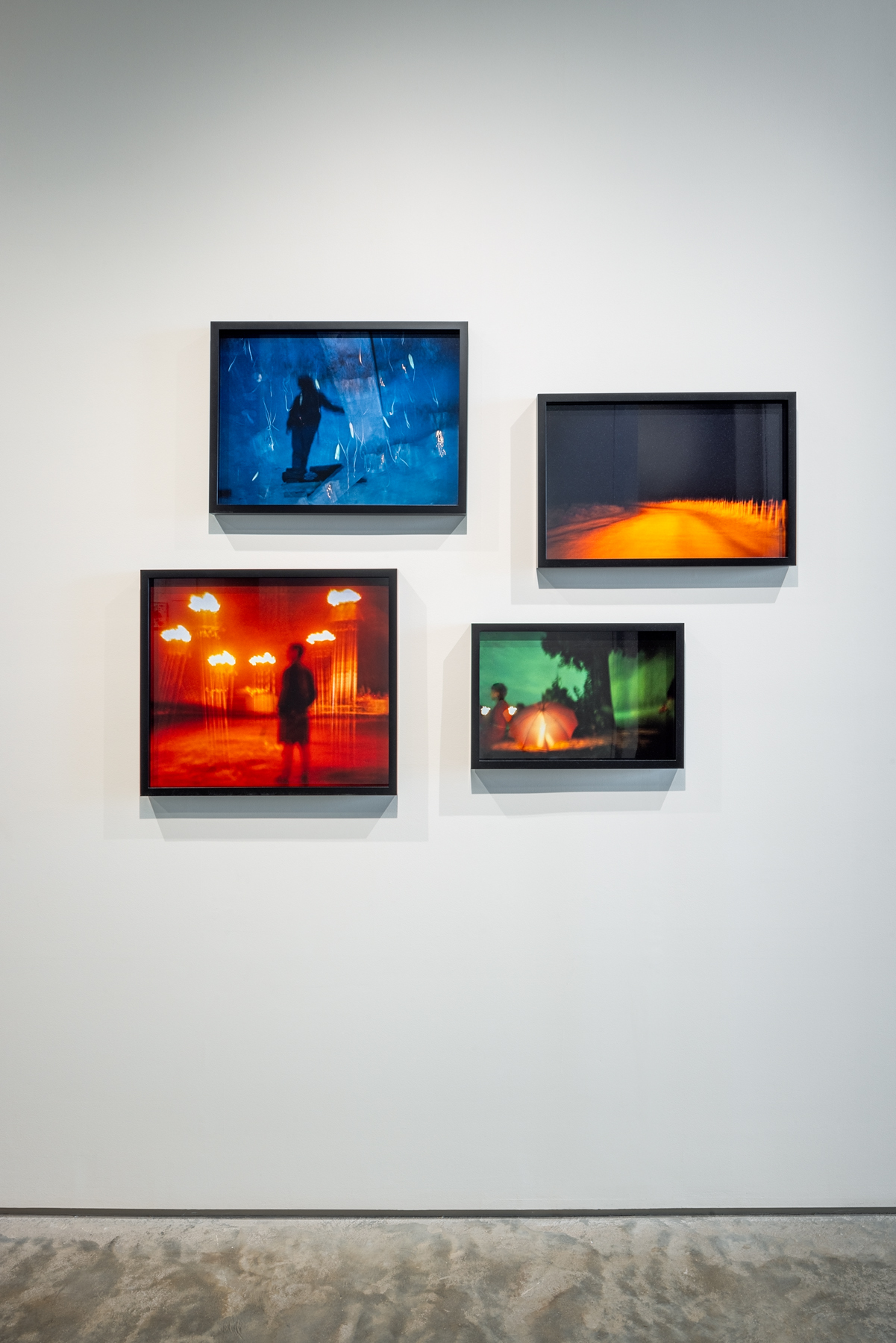 Robert Blake, "Legend - Road to Beauduc," 1996. Cibachrome, 14 7/16 x 21 15/16 inches; "Legend - André Breton's Last Wish," 1990. Cibachrome, 12 x 18 inches; "Legend - Untitled (silhouette with fireworks) ," ca. 1988 - 1998. Cibachrome, 16 1/4 x 22 1/8 inches; "Legend - Untitled (man with lights)," ca. 1988 - 1998. Cibachrome, 18 1/4 x 22 inches. Photo by Rafael Gamo.