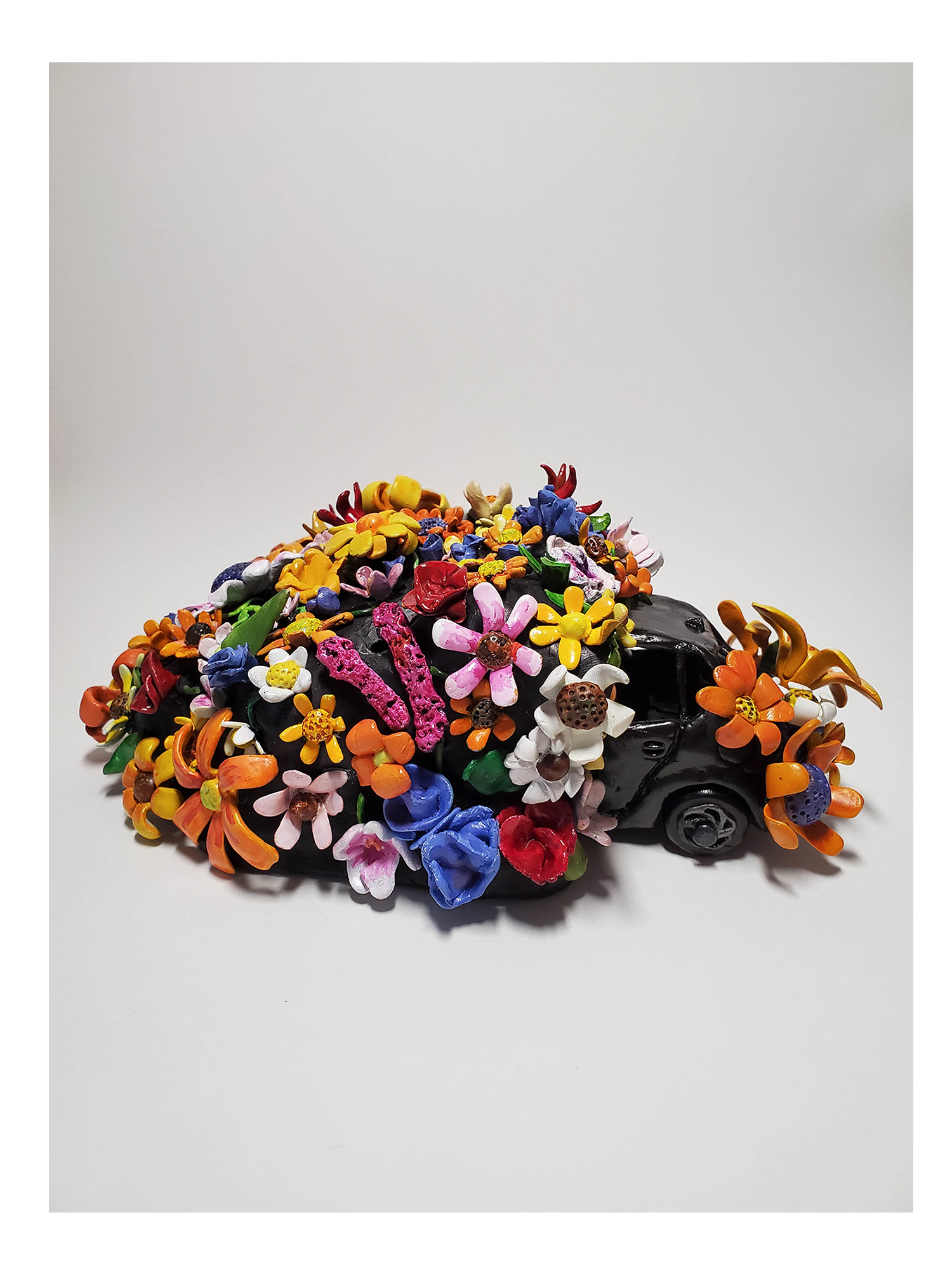 Rock On, Matt! 2020. 7" x 8" x 5.5", epoxy clay, acrylic paint.