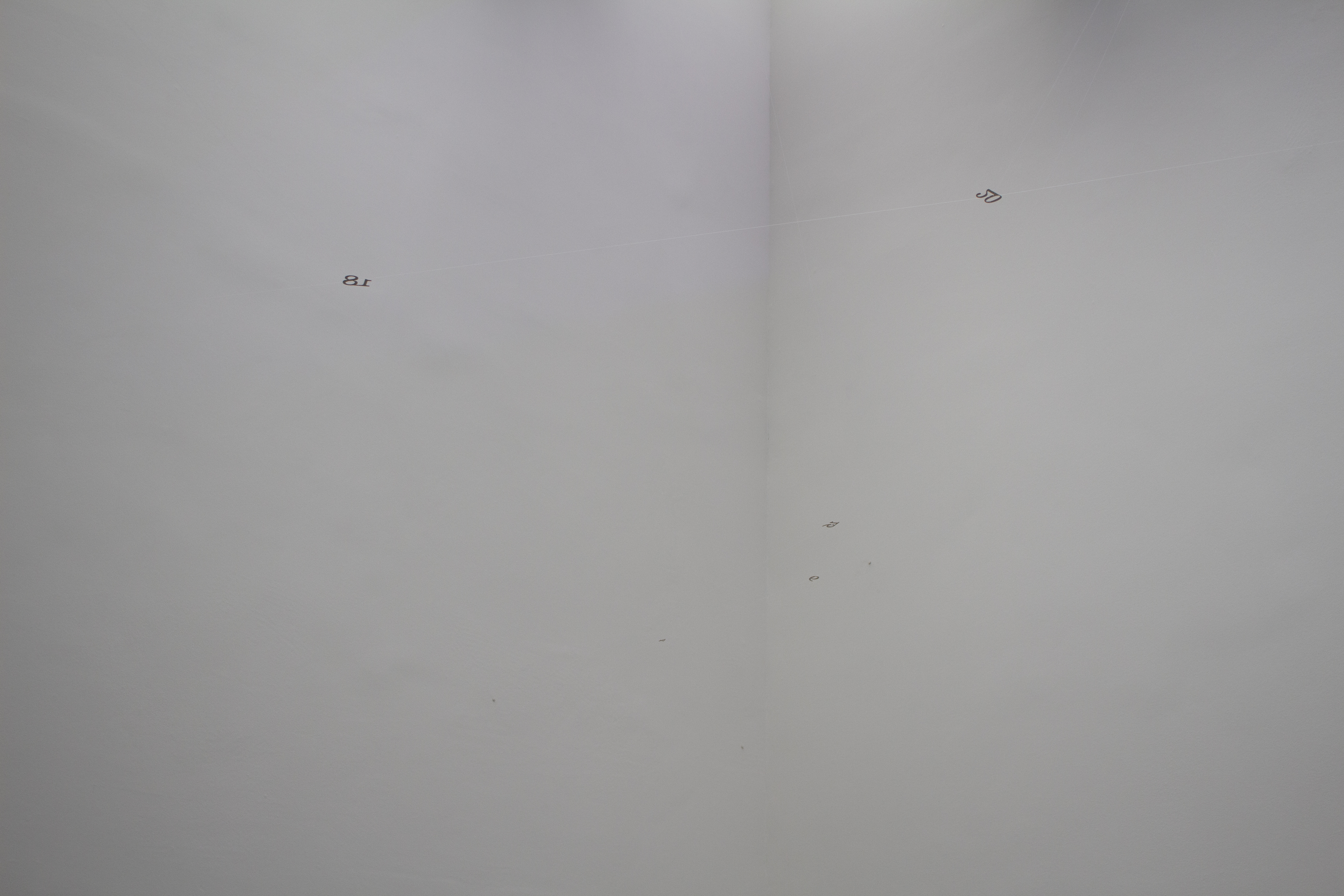 “check it's all fine”, 2021, thread, laser cut numbers, dimensions variable