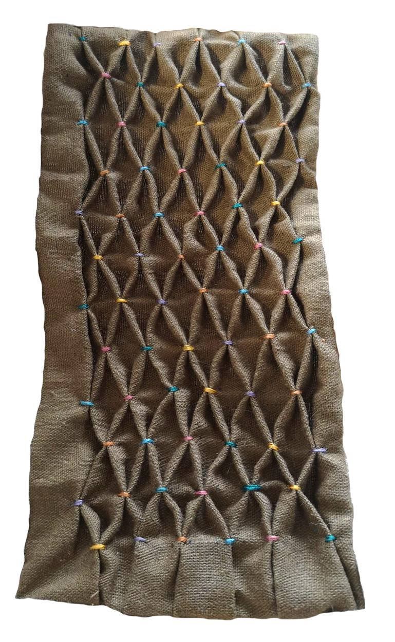 Although much of the quilt is made up of embroidered patches I also made more traditional patchwork squares while I was looking into the history of quilt and patchwork. The other techniques used was smocking and fi ne gauge knit.