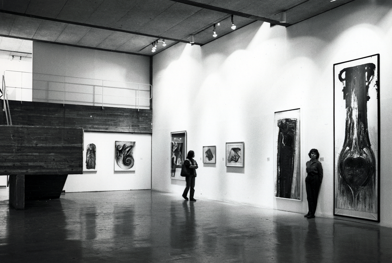 Leo Holub: Three photographs of Jay DeFeo standing in McBean Gallery at SFAI, Adaline Kent exhibition, 1984; gelatin silver prints; © Courtesy of The Estate of Leo Holub.