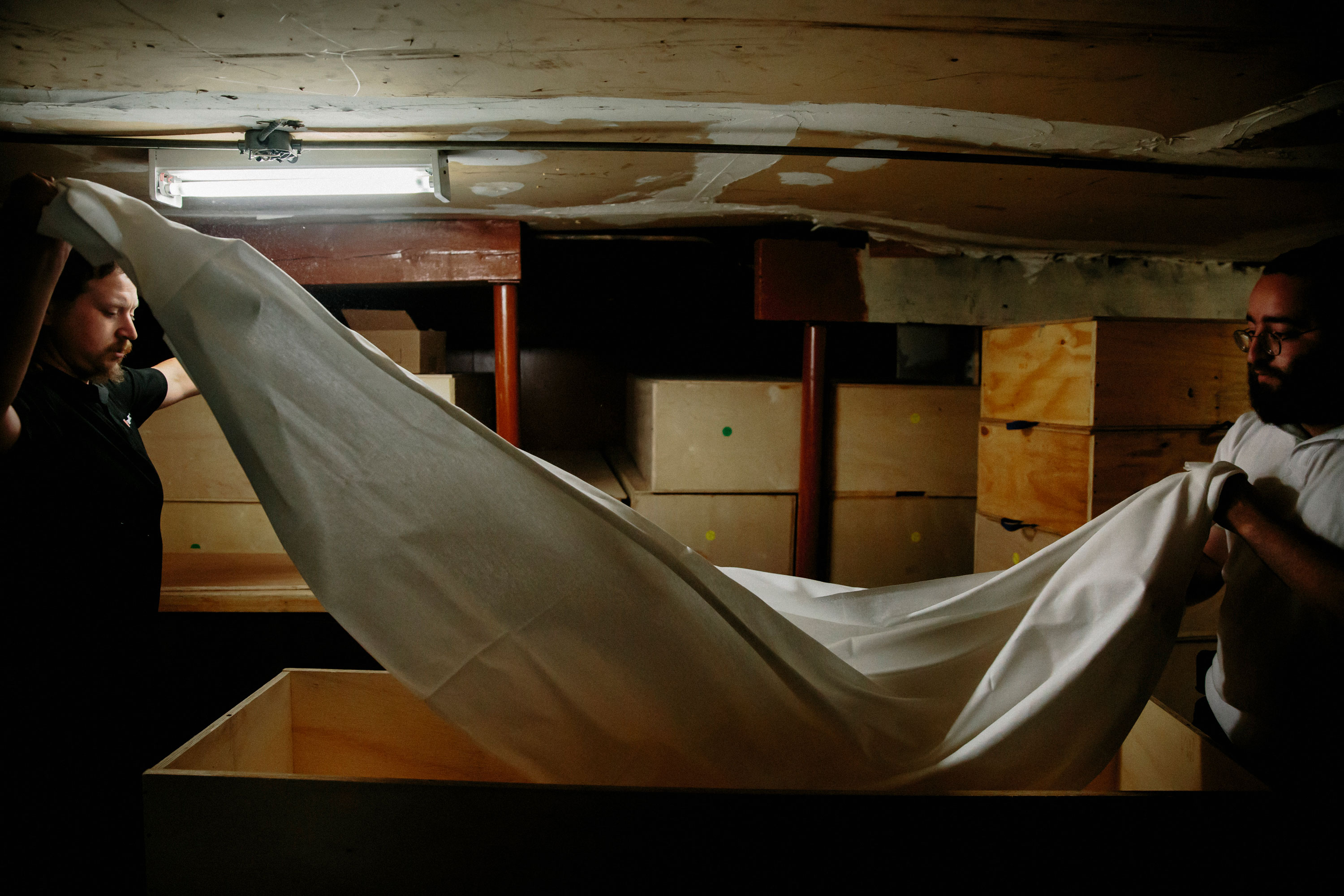 Oberlander and Weisblum lay the ceremonial Tachrichim, or outer garment, into the coffin in which the deceased will be placed after the Tahara. Oberlander said Chesed Shel Emes “means you’re doing a good deed for someone without a return.”