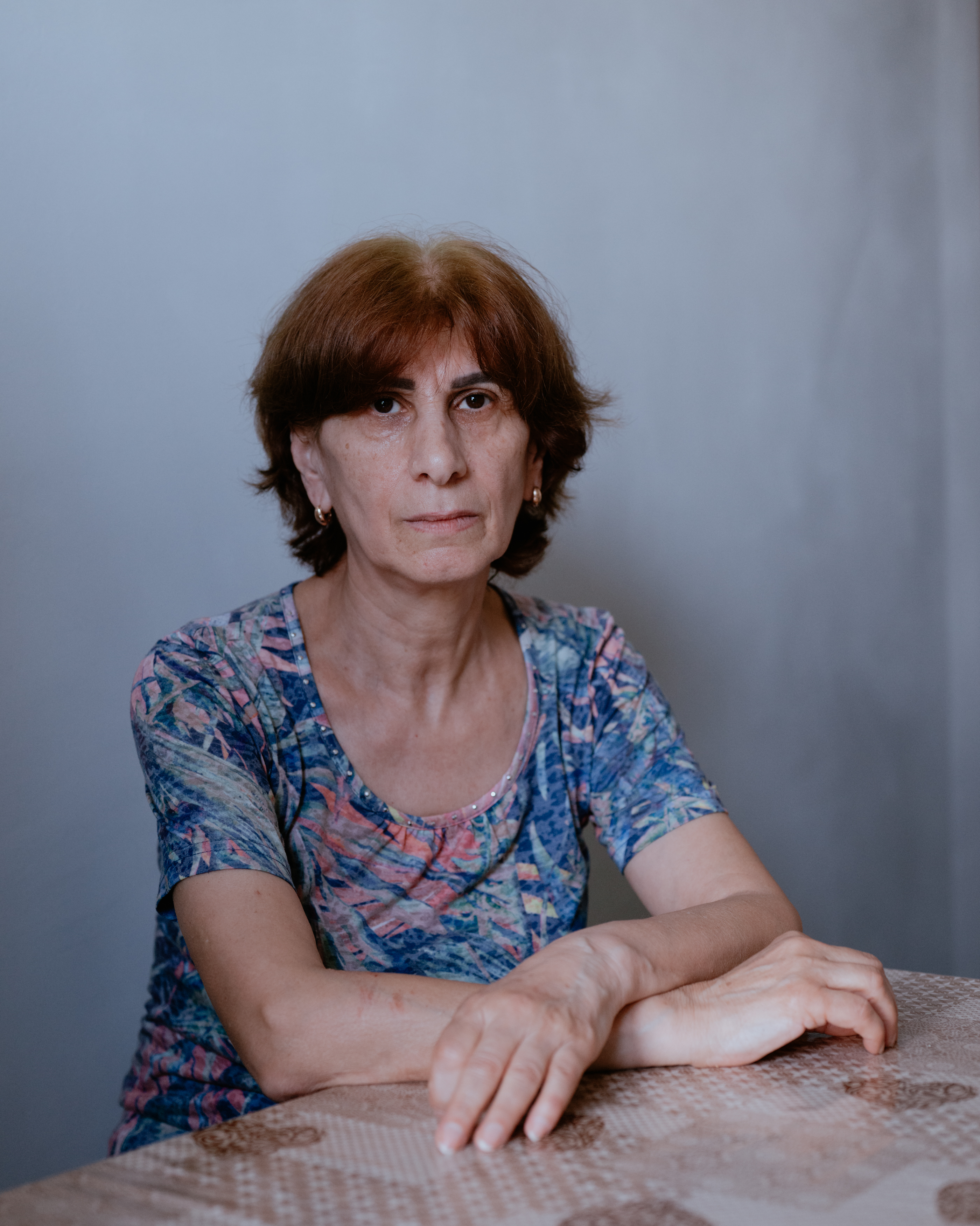 Susanna, 60, in her apartment. She was born and raised as an Armenian in Baku and fled to Armenia amid ethnic violence in the late 1980s, before the collapse of the Soviet Union. She now lives in a town near Yerevan, together with other former residents of Baku.