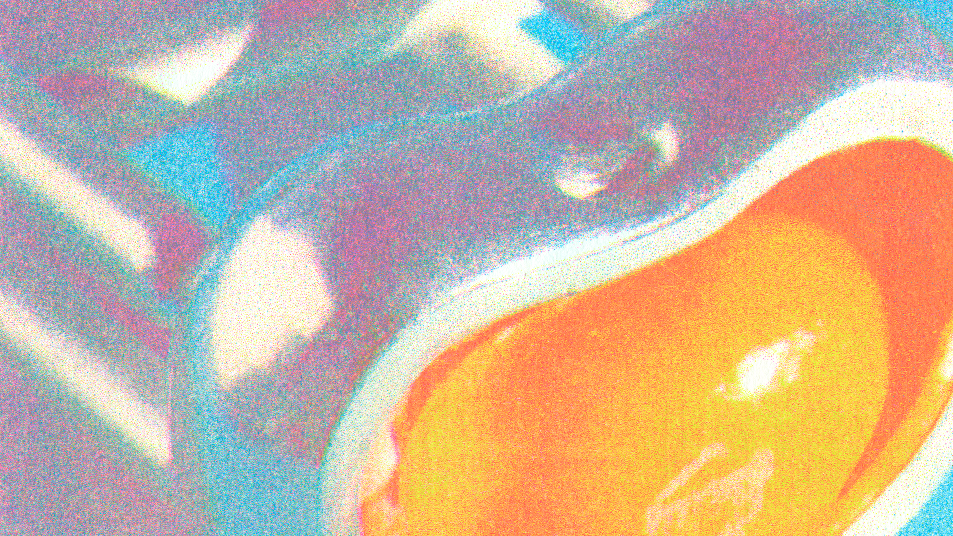 A scan of a risograph print, printed with aqua, fluorescent pink, and light lime ink. The print depicts a close-up image of a shiny, silver bean-shaped locket ring in front of a blue background. The ring is tipped forward and the bean locket is open, revealing a bright orange Jelly Belly bean within. The title of the piece in this image is “Jelly Belly Reliquary.”