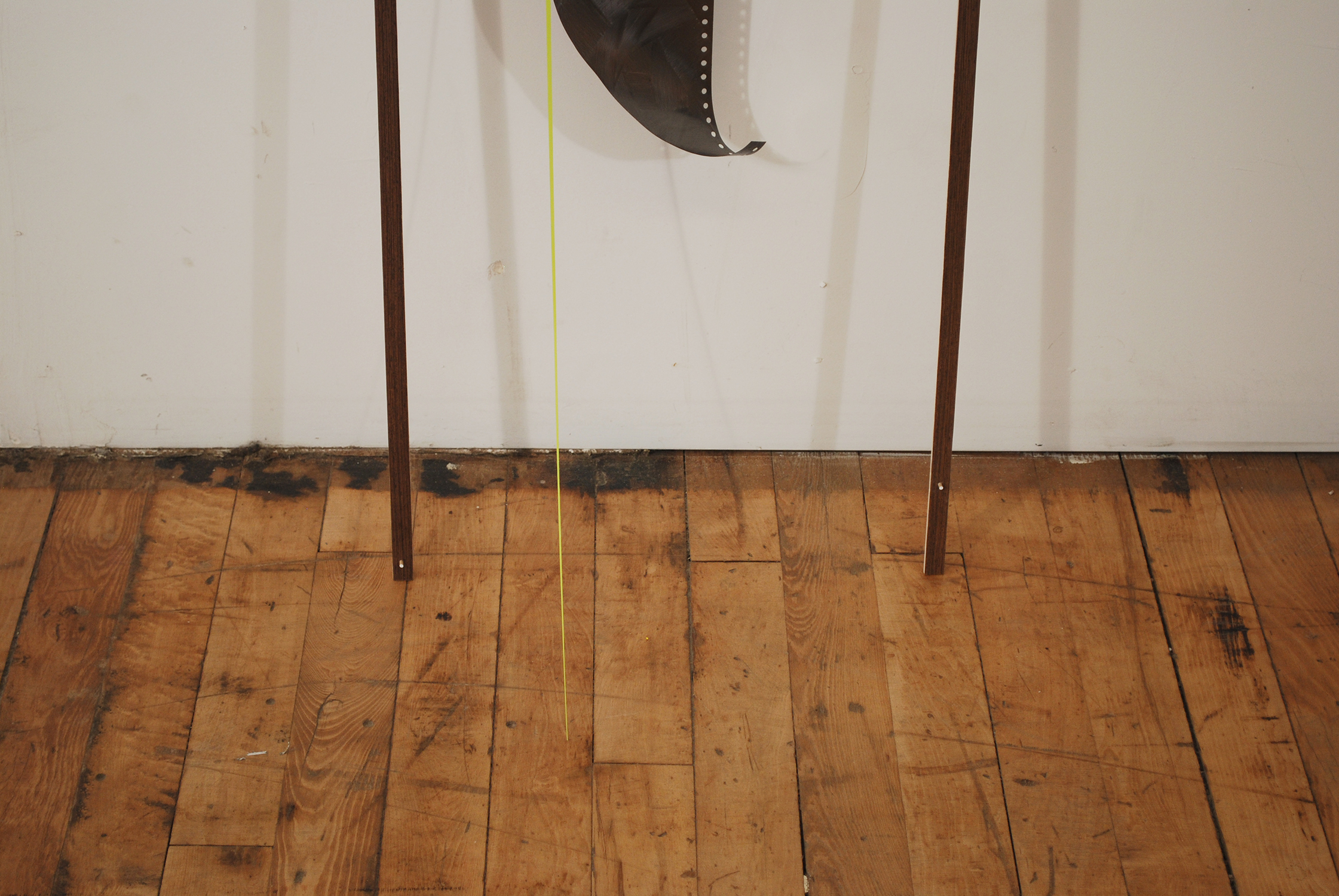 station cruciform  Graphite and tape on paper and mylar. Formica and wood.  2011 - 76 x 23 x 2