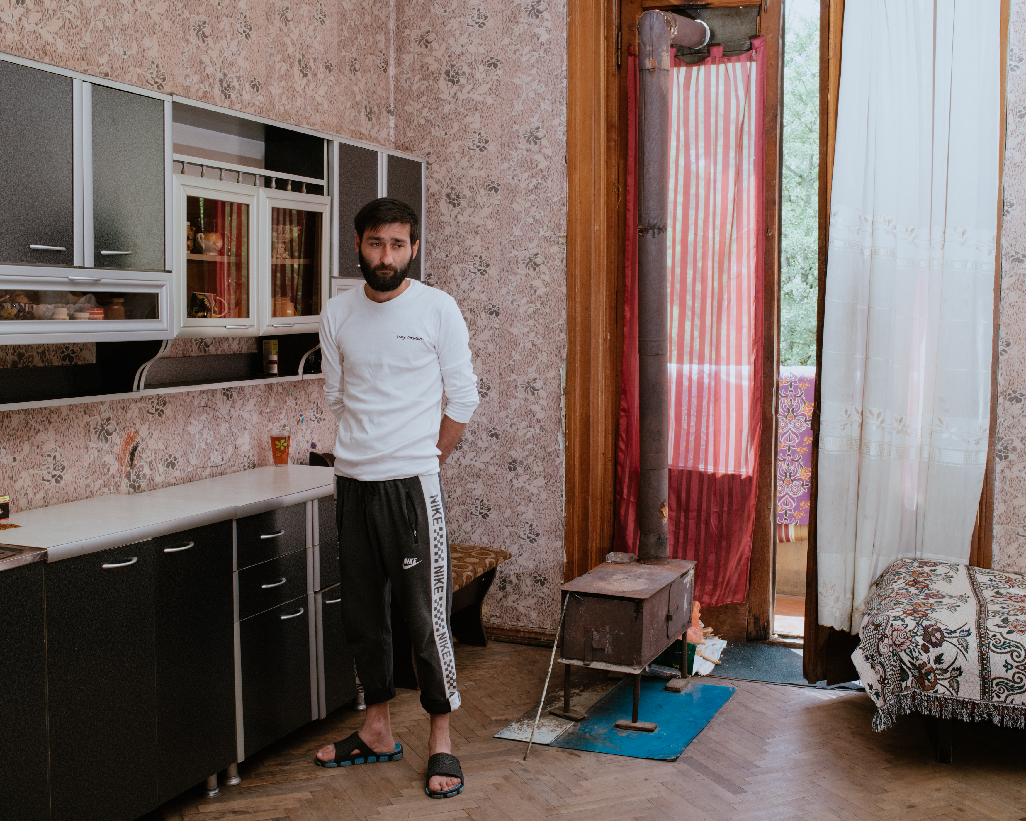 Maco in his room in an abandoned Soviet sanatorium. He fled Abkhazia in 1992 and has lived in the hotel ever since.