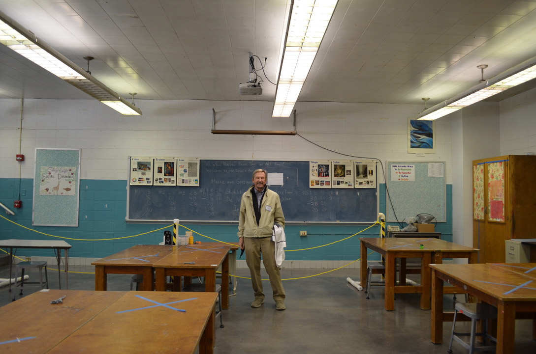My dad! Standing at the front of a classroom he once taught in.