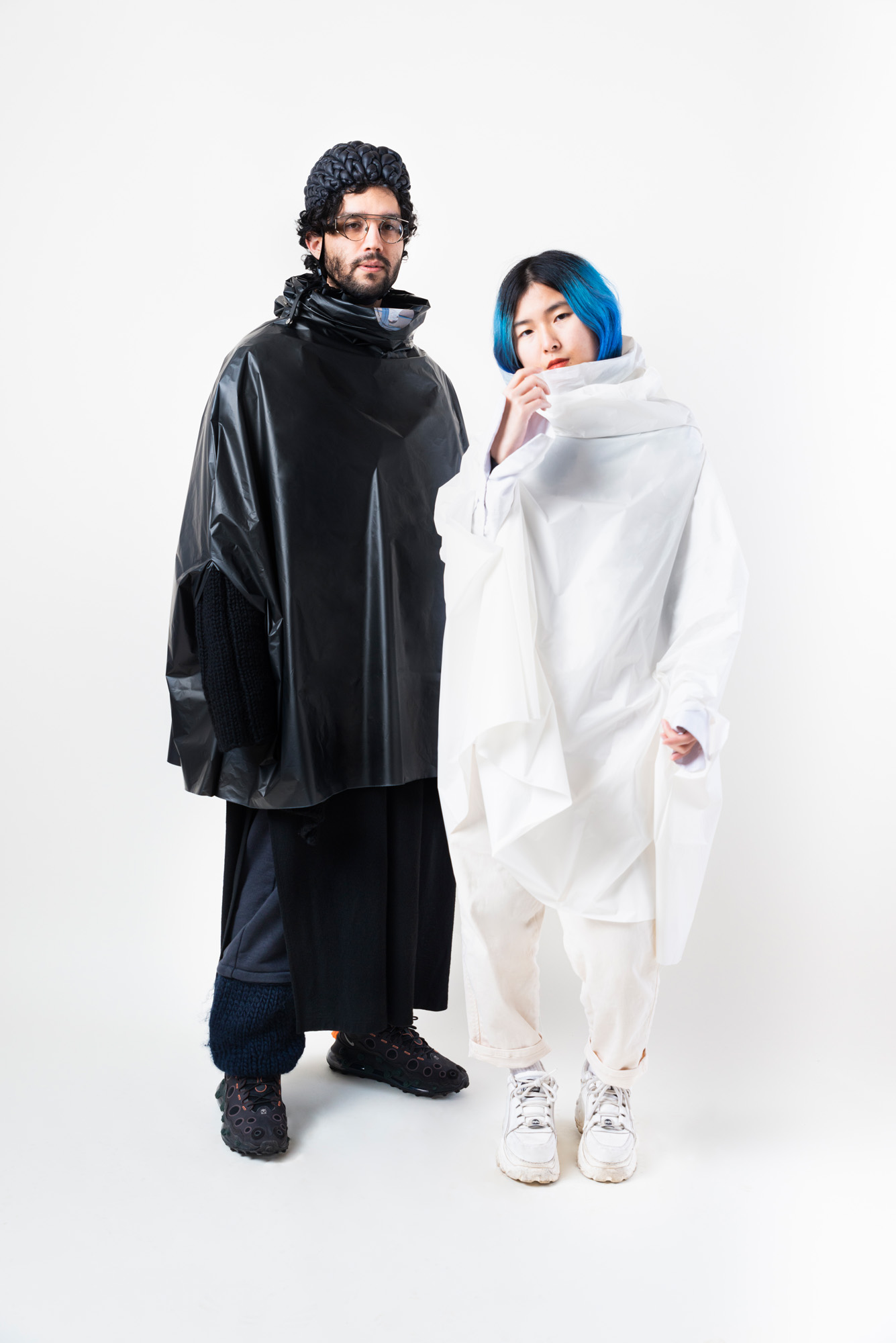 Weather Underground Biodegradable Raincape by Verena Michels COLOUR: monochrome black and monochrome white