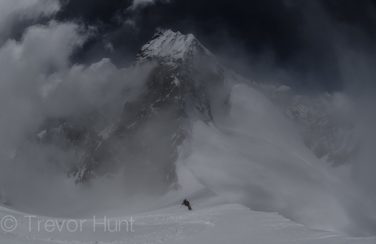 The author cruising own the massive SW flank of Chatyn-Tau. Ushba in the background.