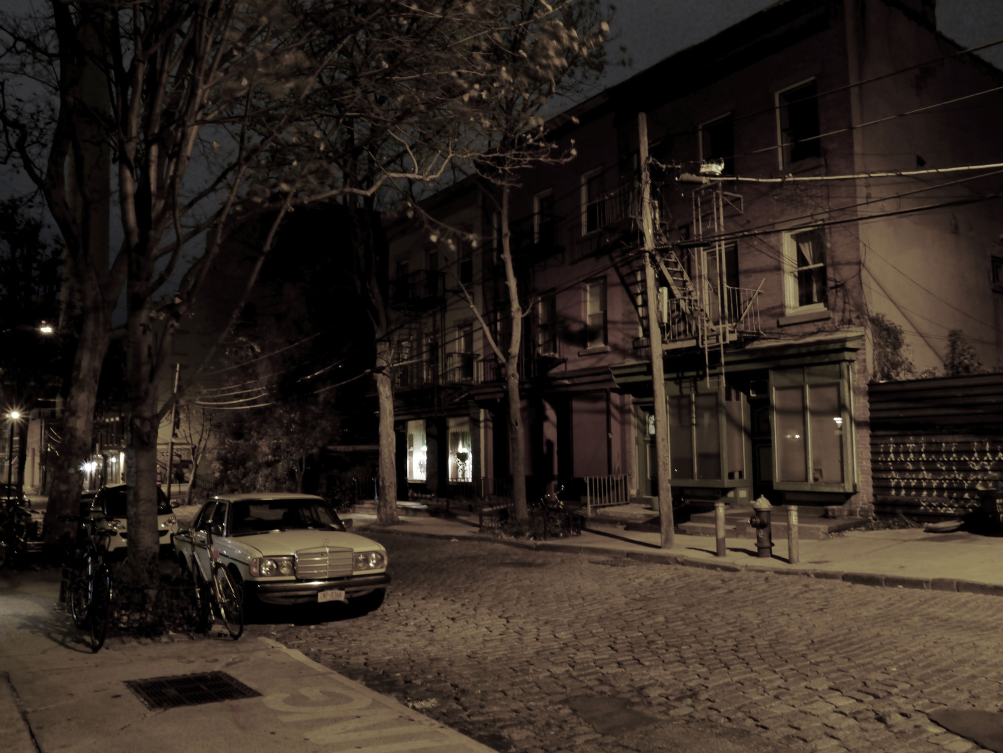 At night, the street regresses even further back in time.