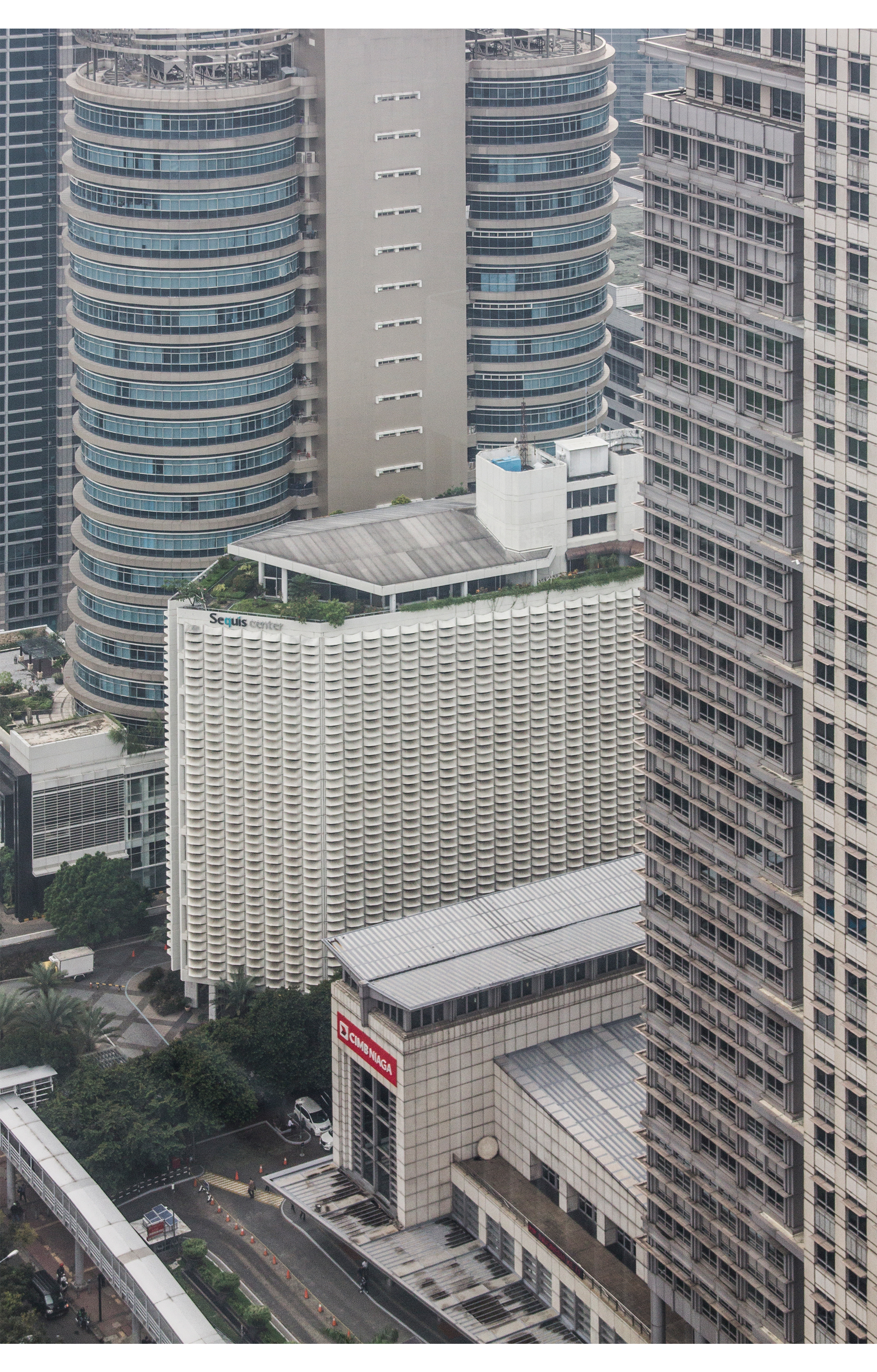 An Assemblage of the Pointed and Pitched Roof. Sequis Centre, Jakarta, Indonesia