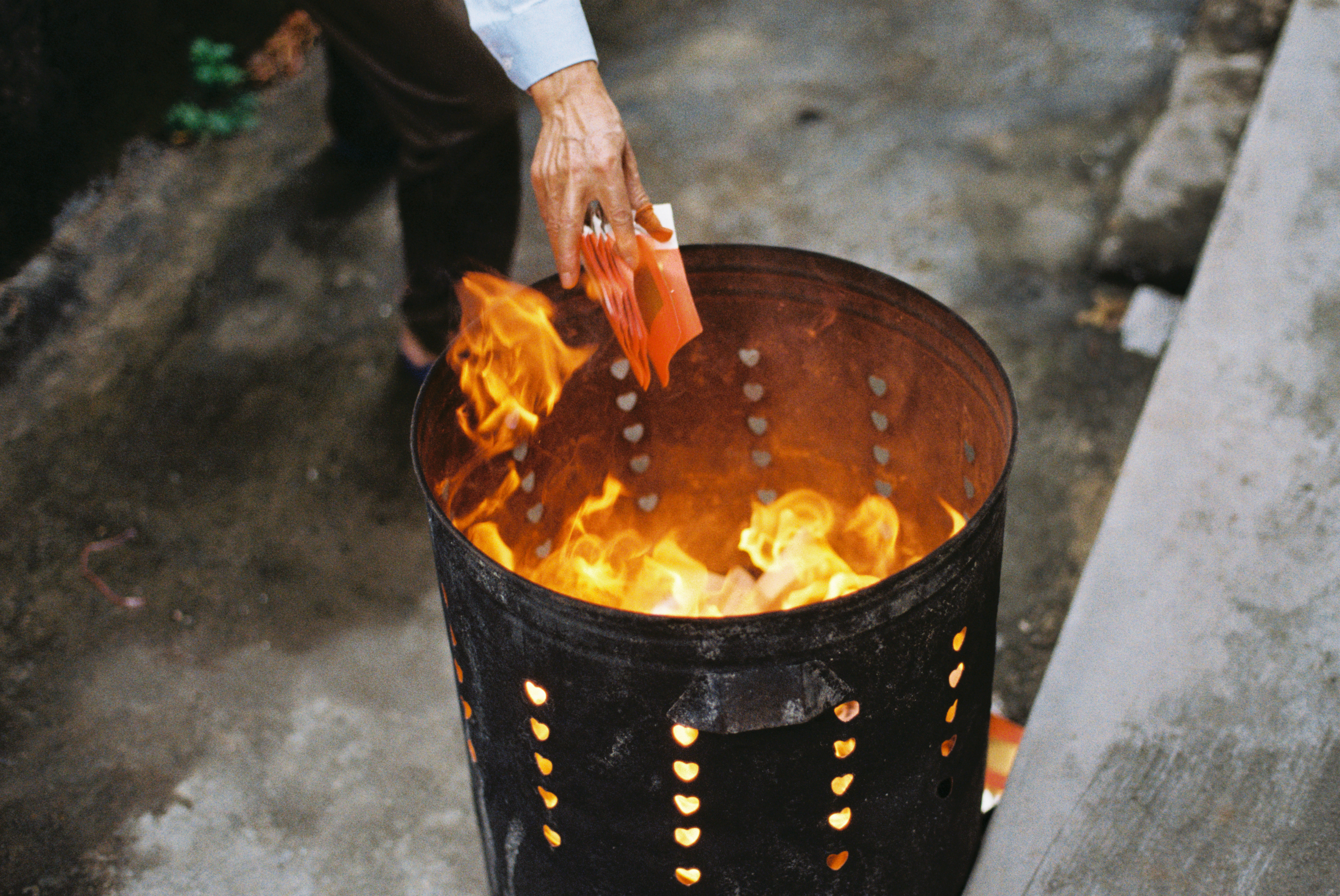 Burning paper money for ansesters at 5am