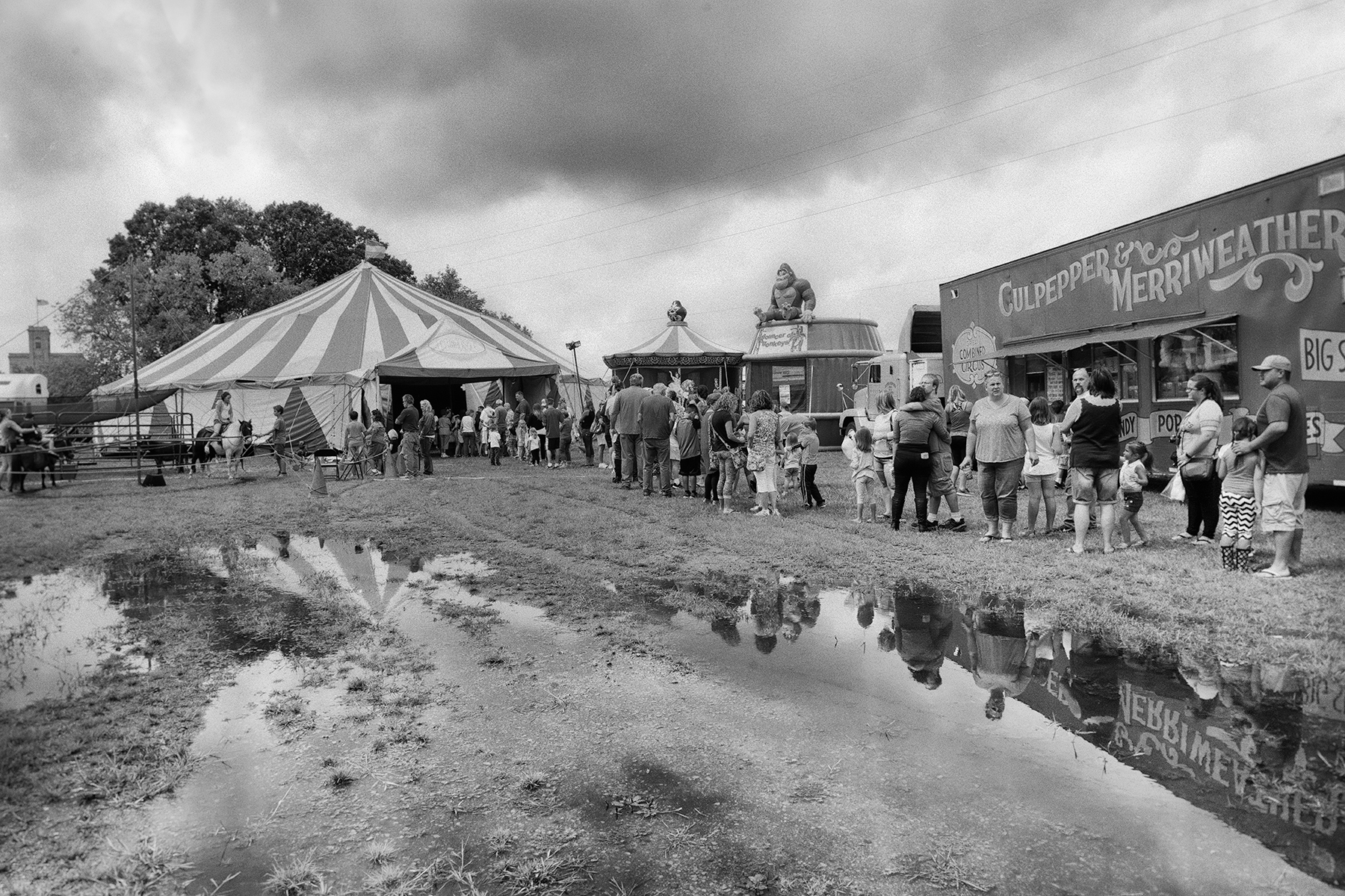 The audience lines up outside the tent in Winneconne, Wisconsin.