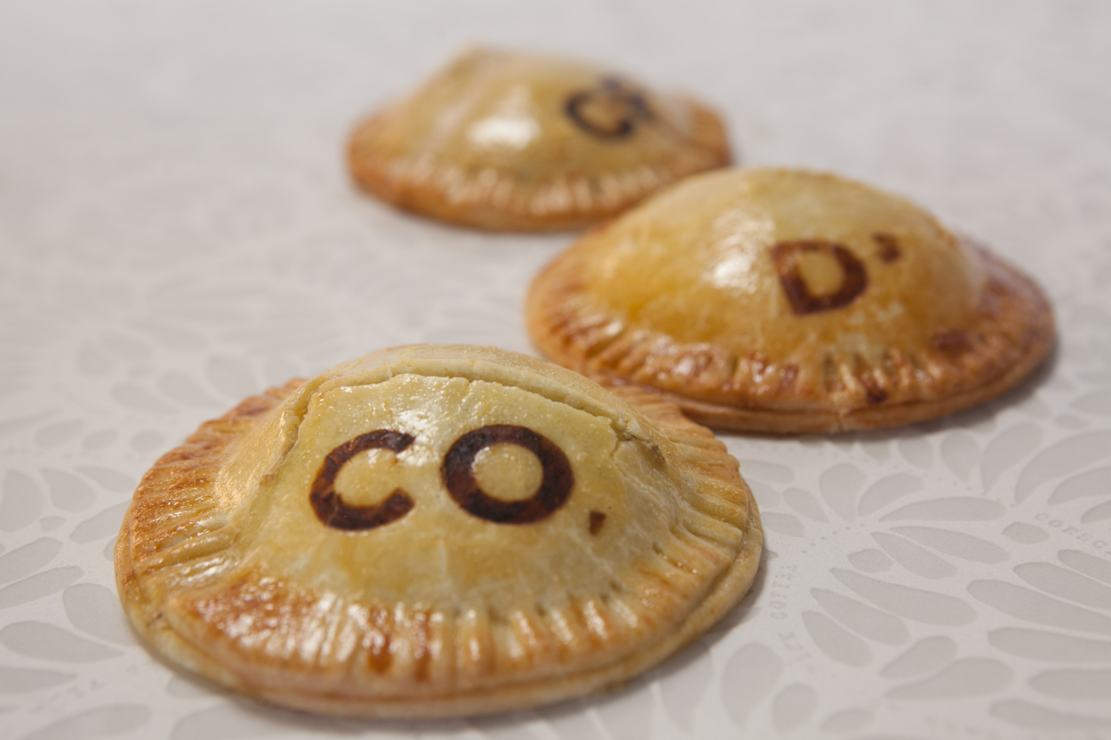 Code name CO. D’ CF printed on empanadas.