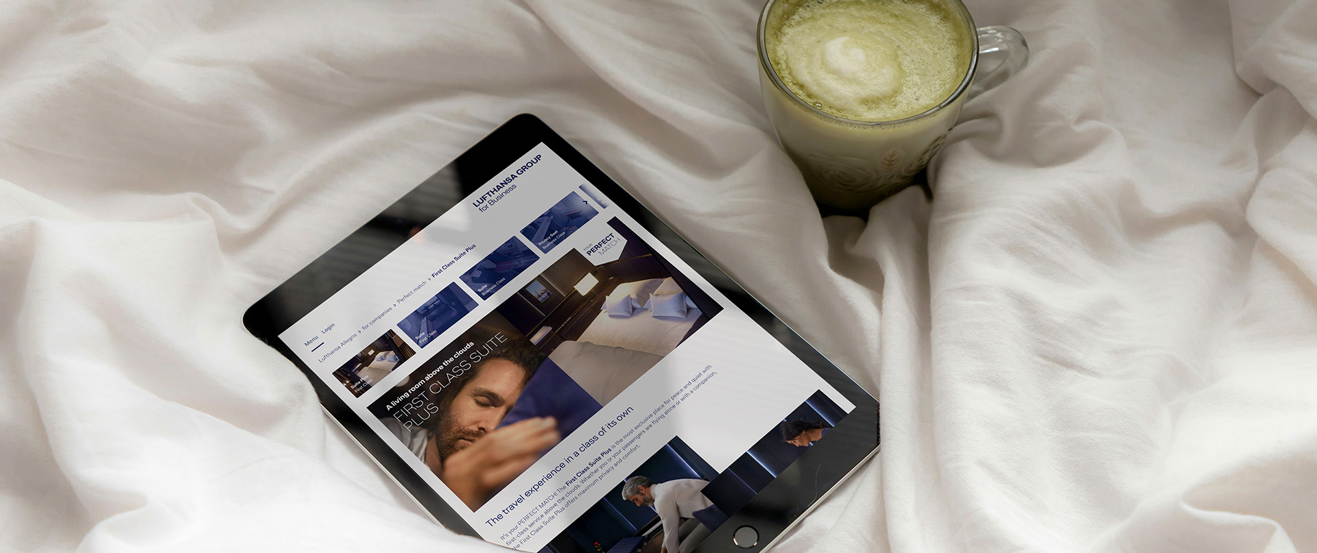 Product Design - a tablet on a comfortable bed with the First Class Suite page of the Lufthansa Group Allegris Microsite on the screen