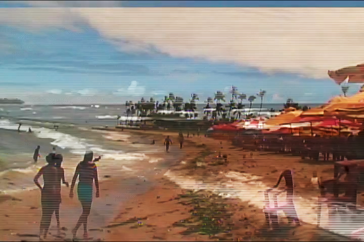 Beachscape of Salvador, Brazil, captured on 8mm film, offering a nostalgic, cinematic view of the coastline with overlapping frames.