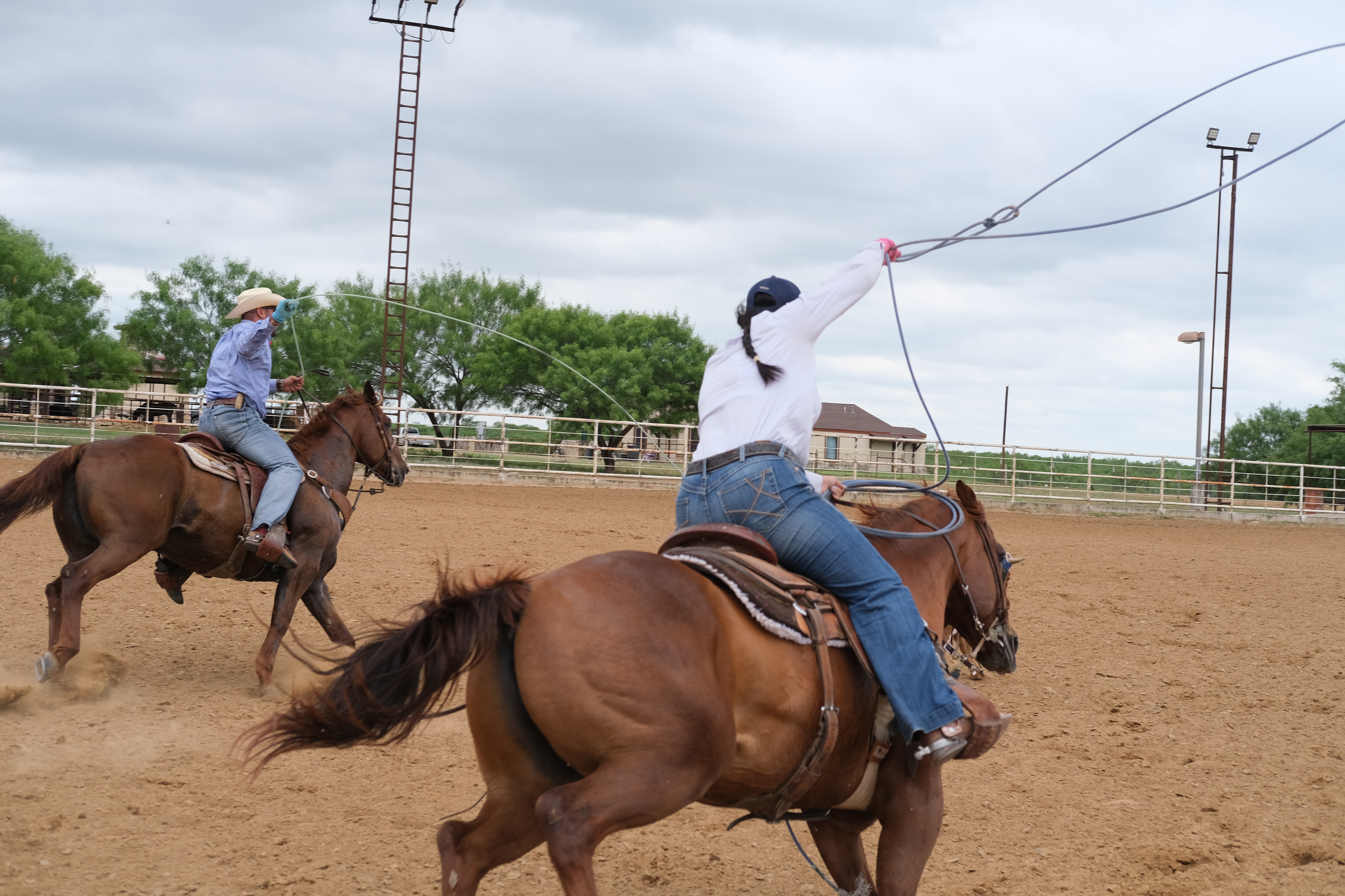 Triana (right) and Tony (left) practice roping near Laredo, TX. 