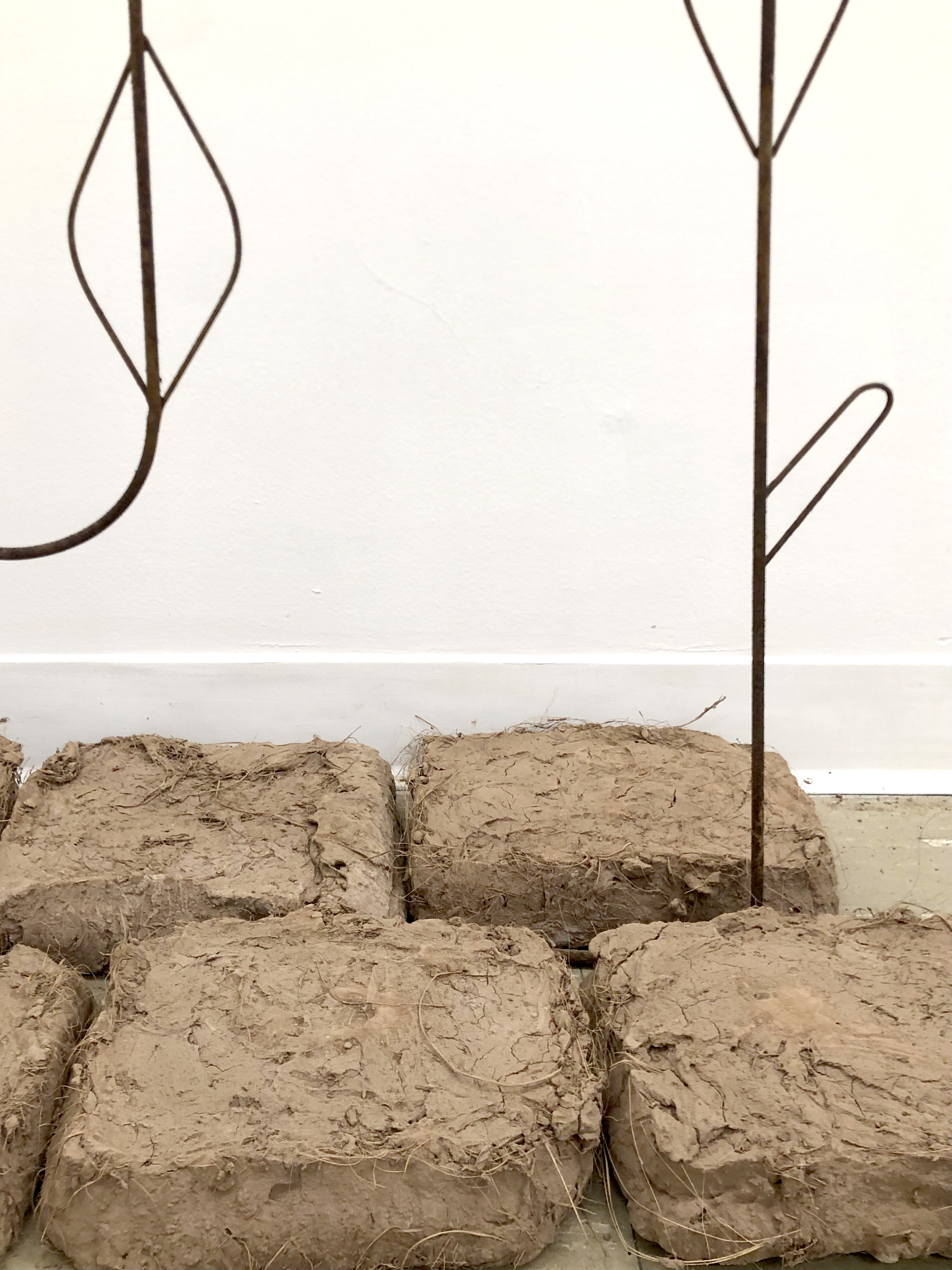 West Adams | Katie Mejía Steel rods, dirt mixed with clay powder (2024)