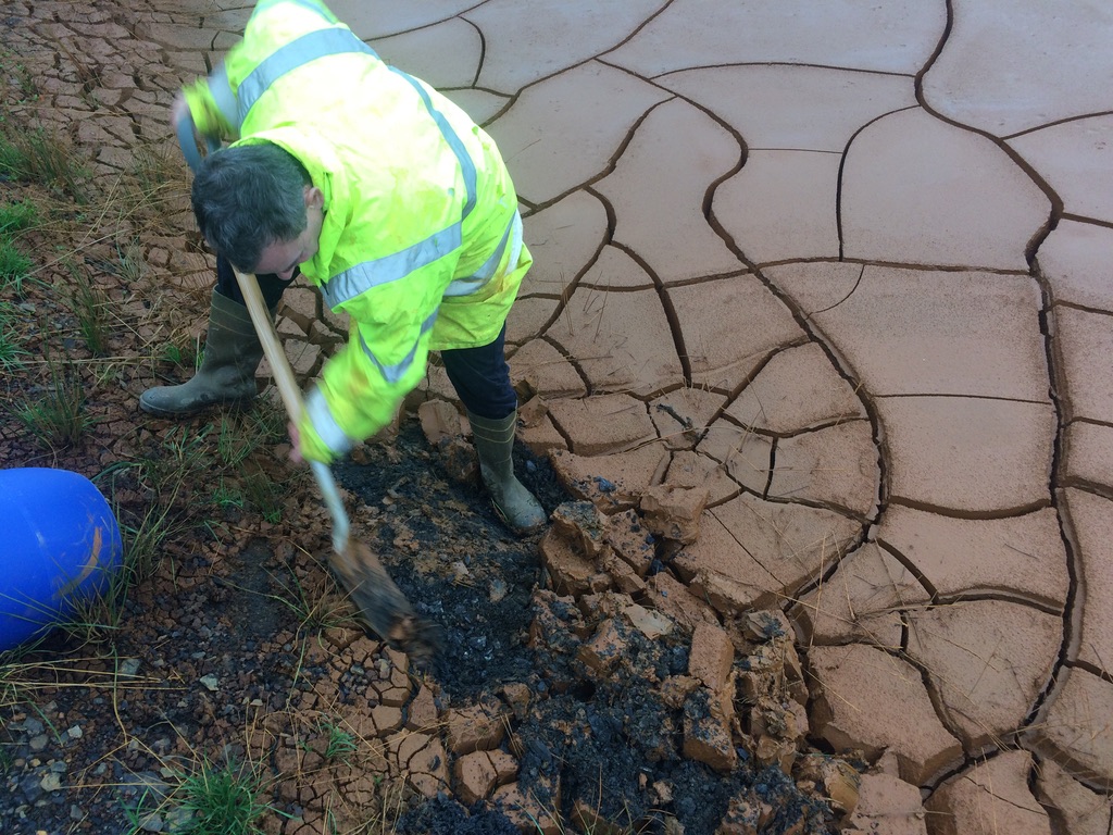Digging out ochre from the Deerplay Hill drying bed