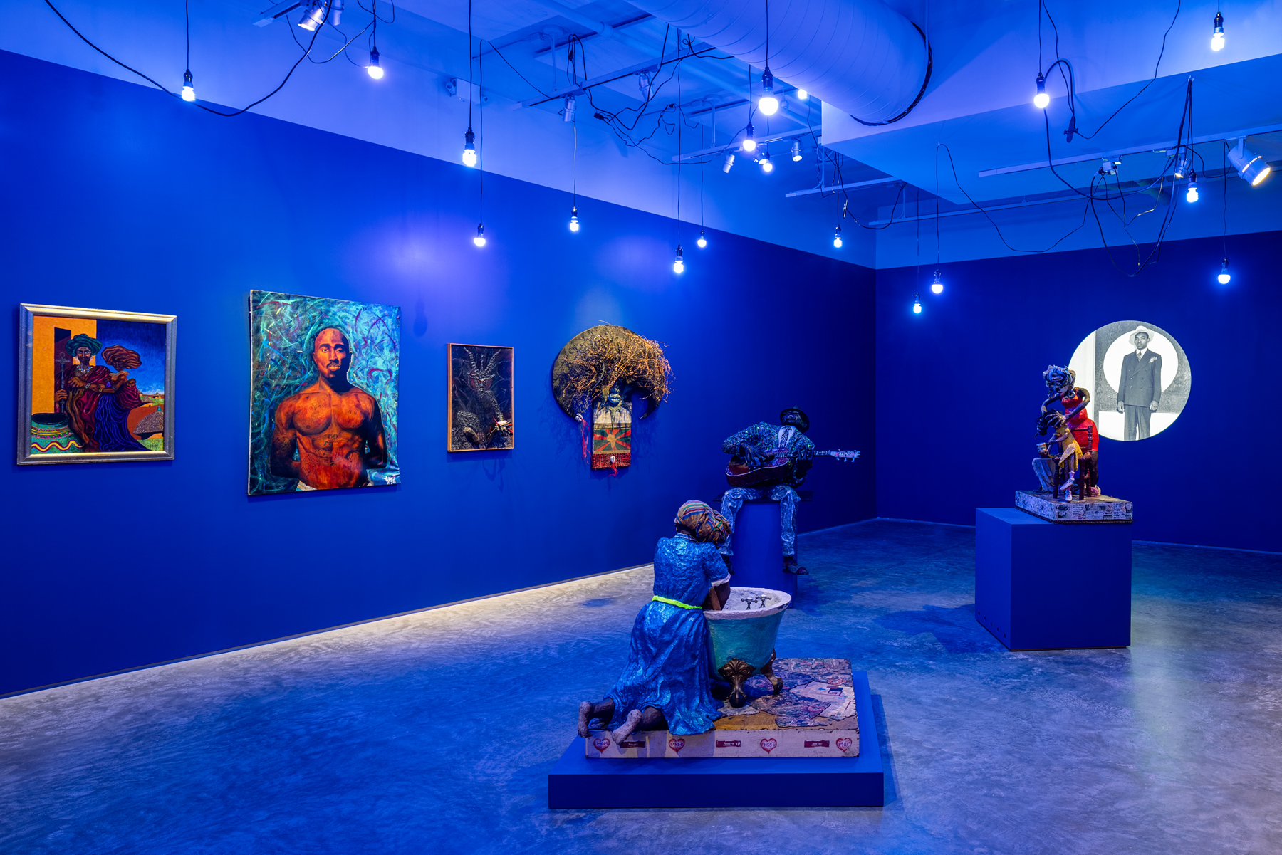  "The Museum of the African's Experience in America," installation view of blue gallery.