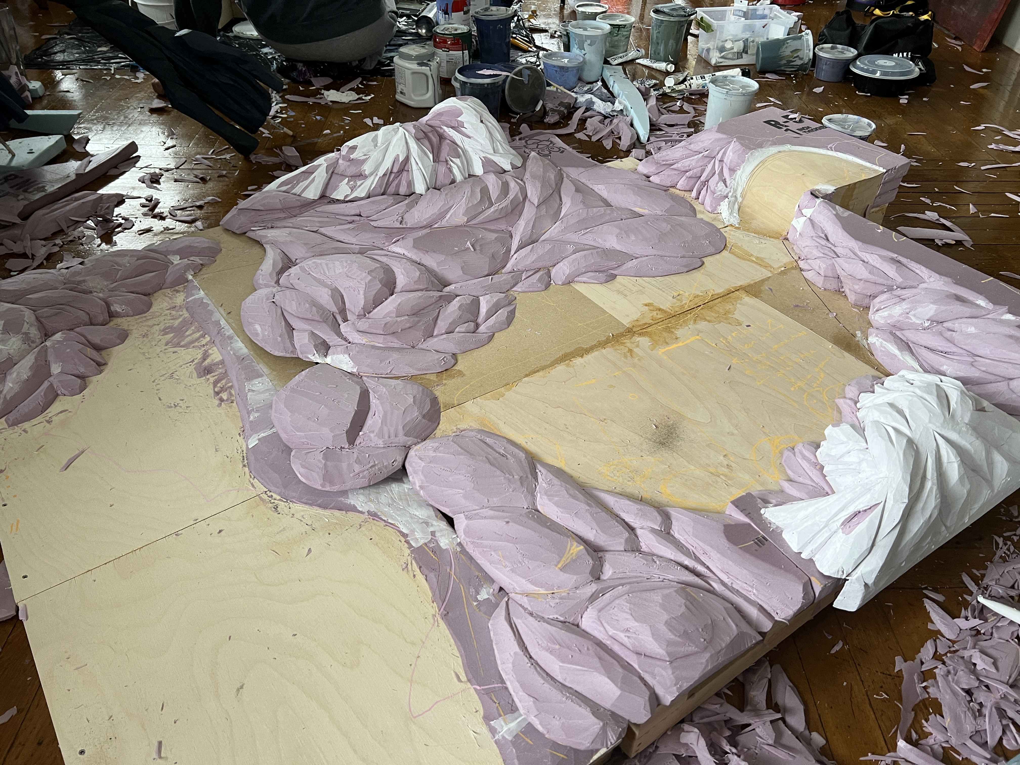 Base Carving: Hang over elements to disguise connection pieces.