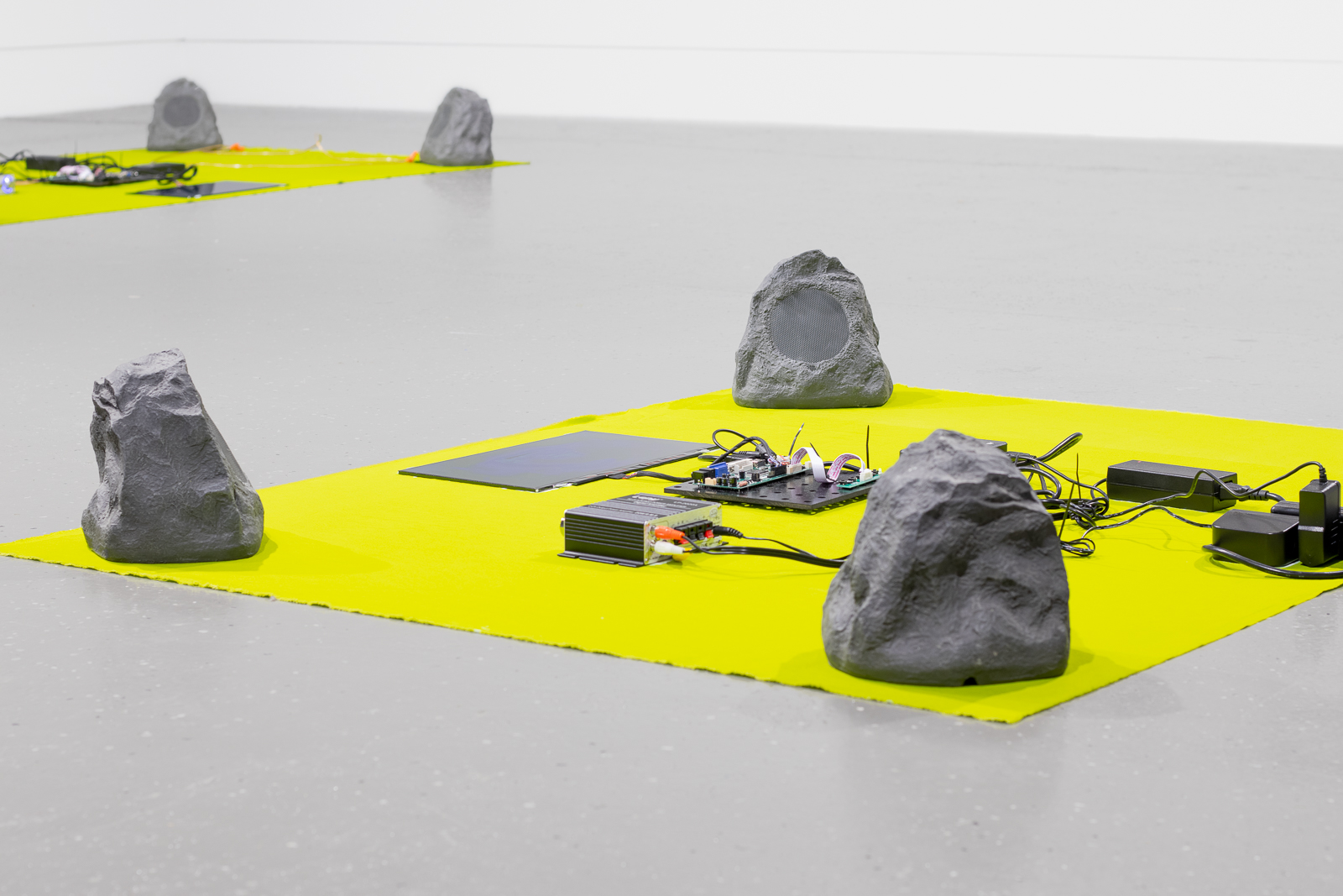 Thermochromic workflow, 2020, heat-sensitive fabric, led screens, led controllers, media players, flash drives, amplifiers, faux rock speakers, cables, each approximately 44 x 77 in. (112 x 196 cm)