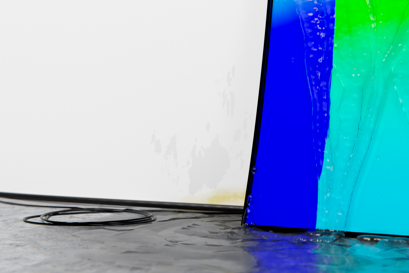 Liquid crystal display (detail), 2020, curved LCD screen, garden hose, pump, hardware, water, 57 x 34 x 17 in. (145 x 86 x 43 cm)
