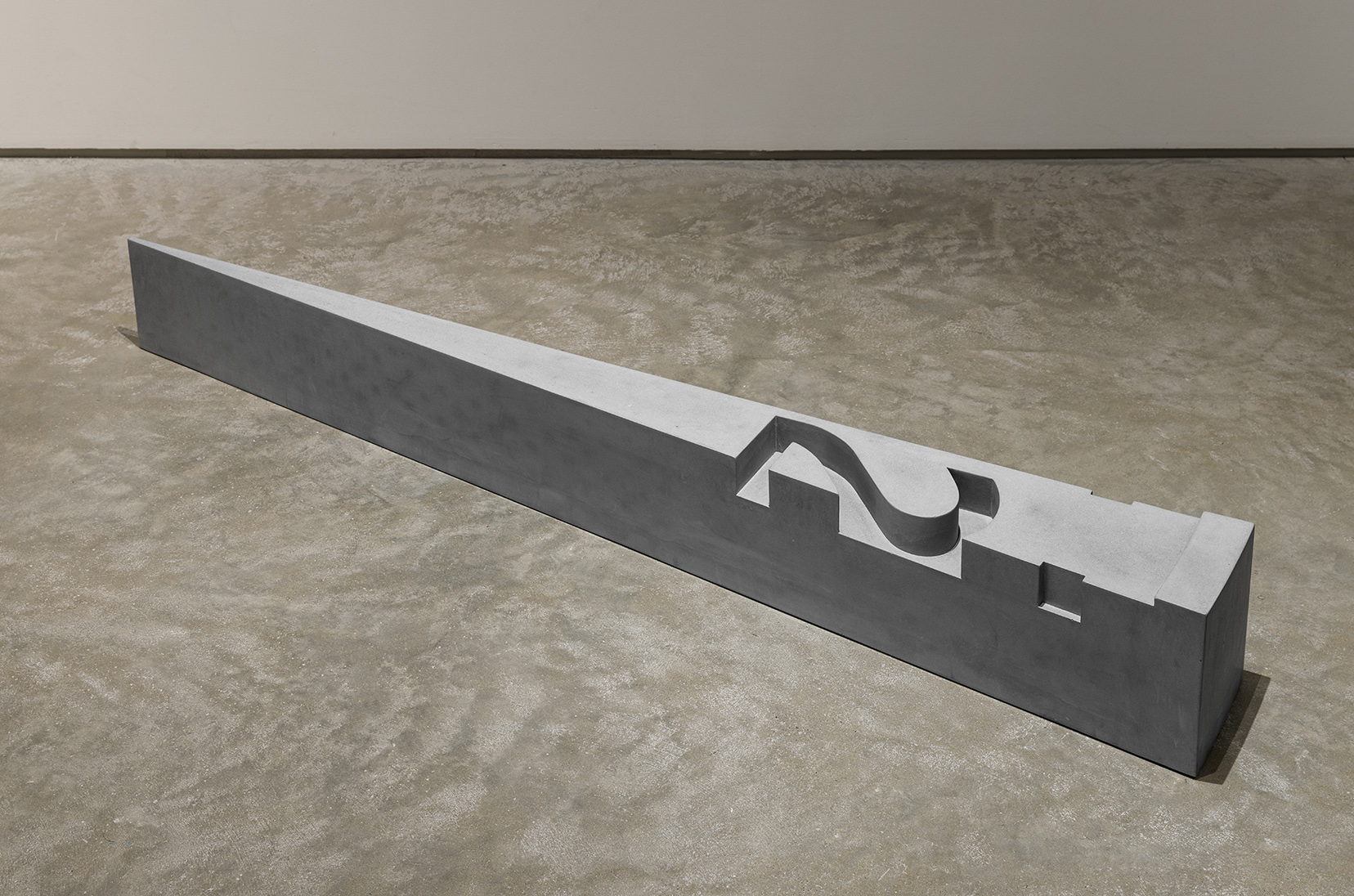 Jorge Macchi, "first second," 2013. Polymer concrete, 7 3/4 x 66 x 7 1/2 inches. Photo by Etienne Frossard.