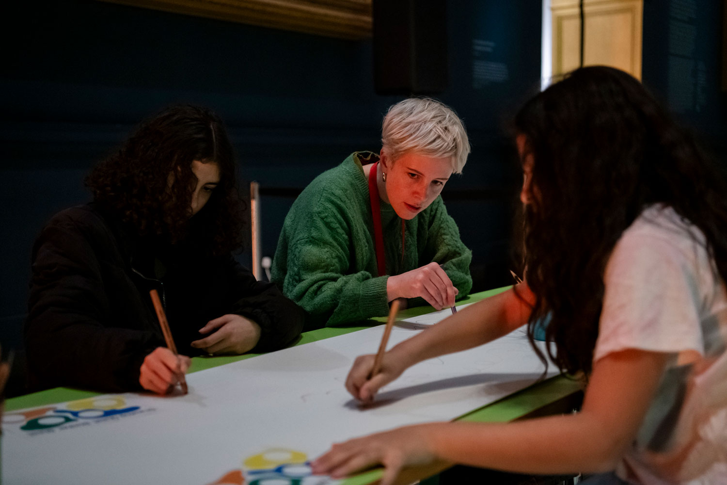 Drawing sound together on shared paper roll. Photo by Sandra Ebert.