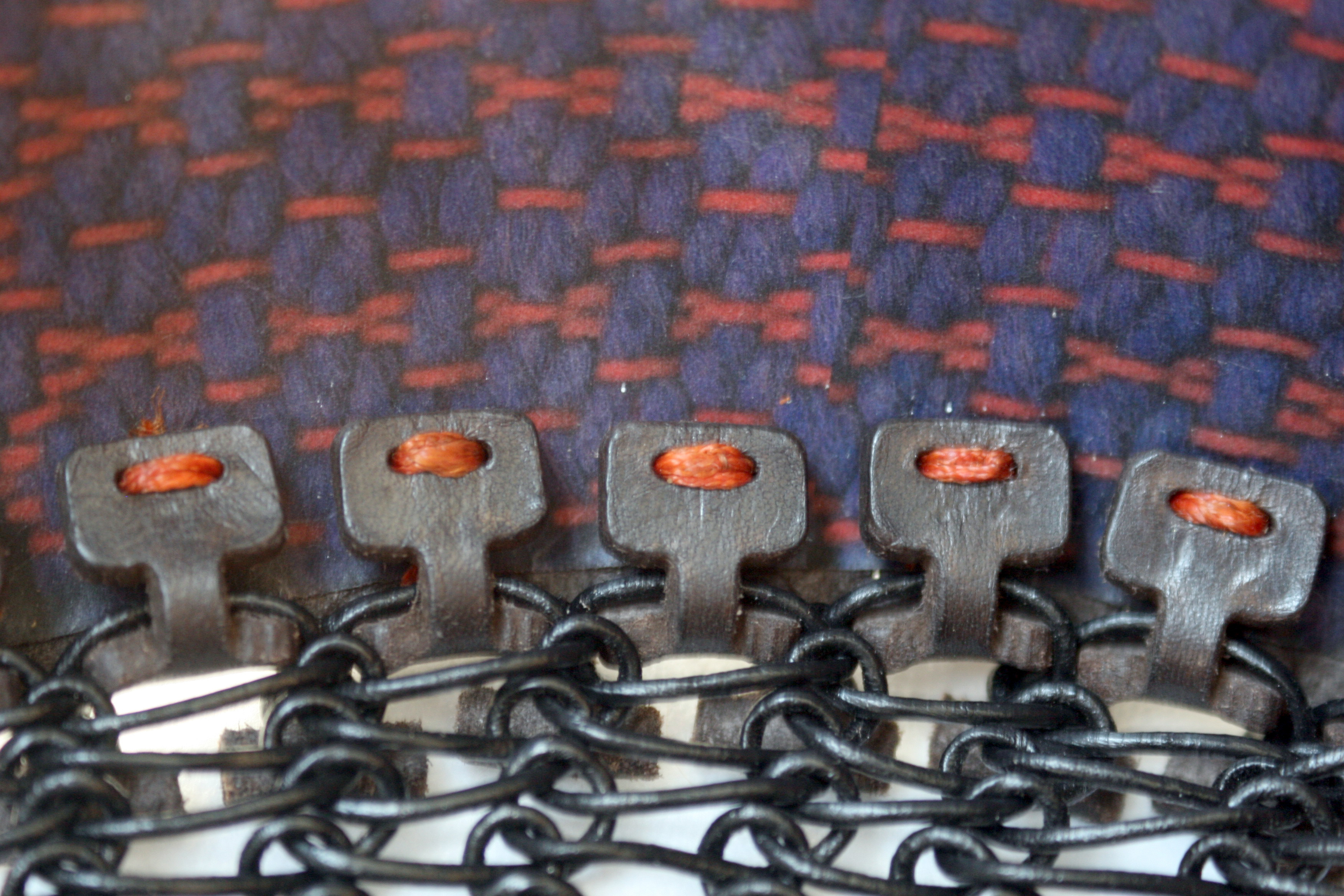Hand-stitched 'peg' detail