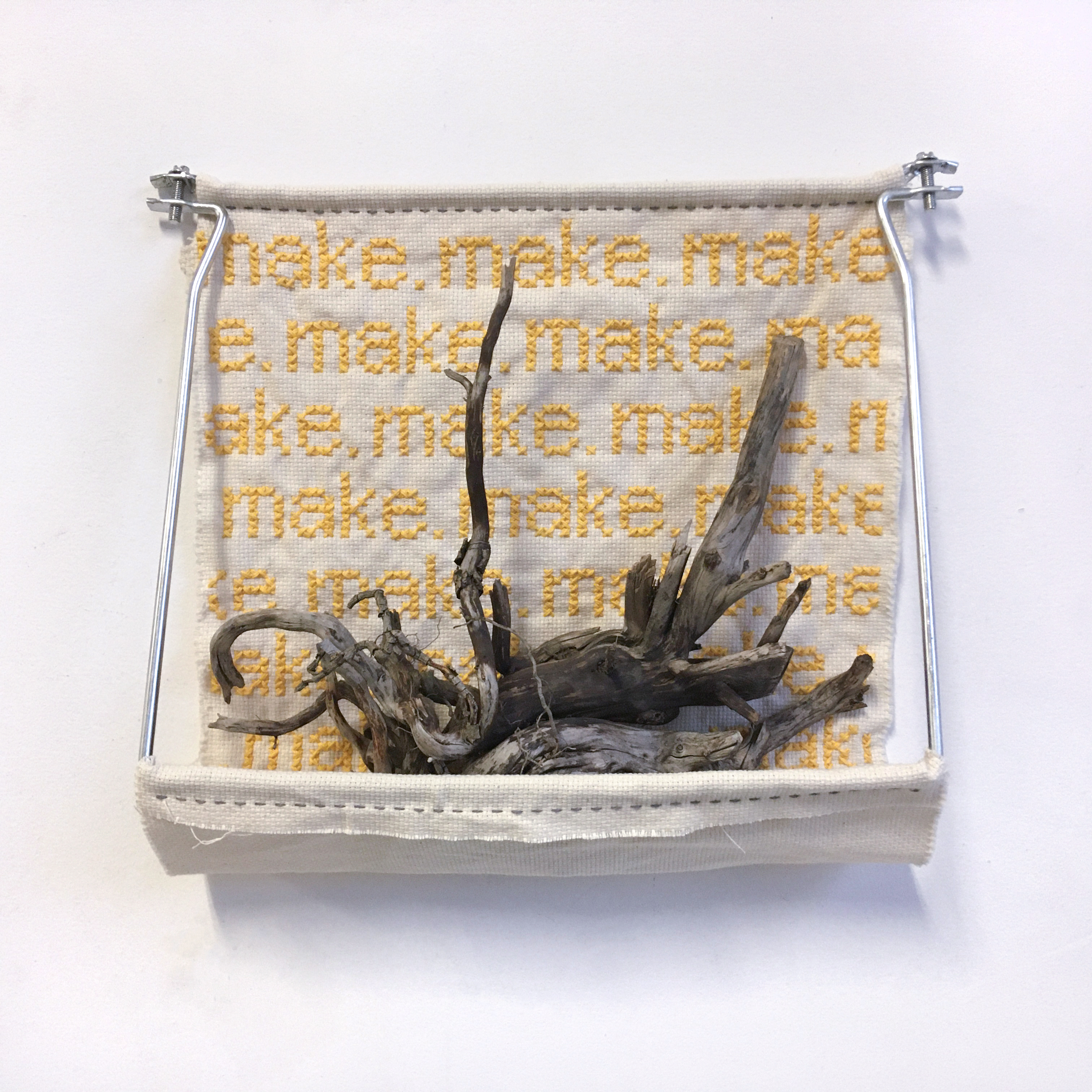 Make (Reciprocal). file cabinet metal insert, embroidery fabric, string, & branch. 2021