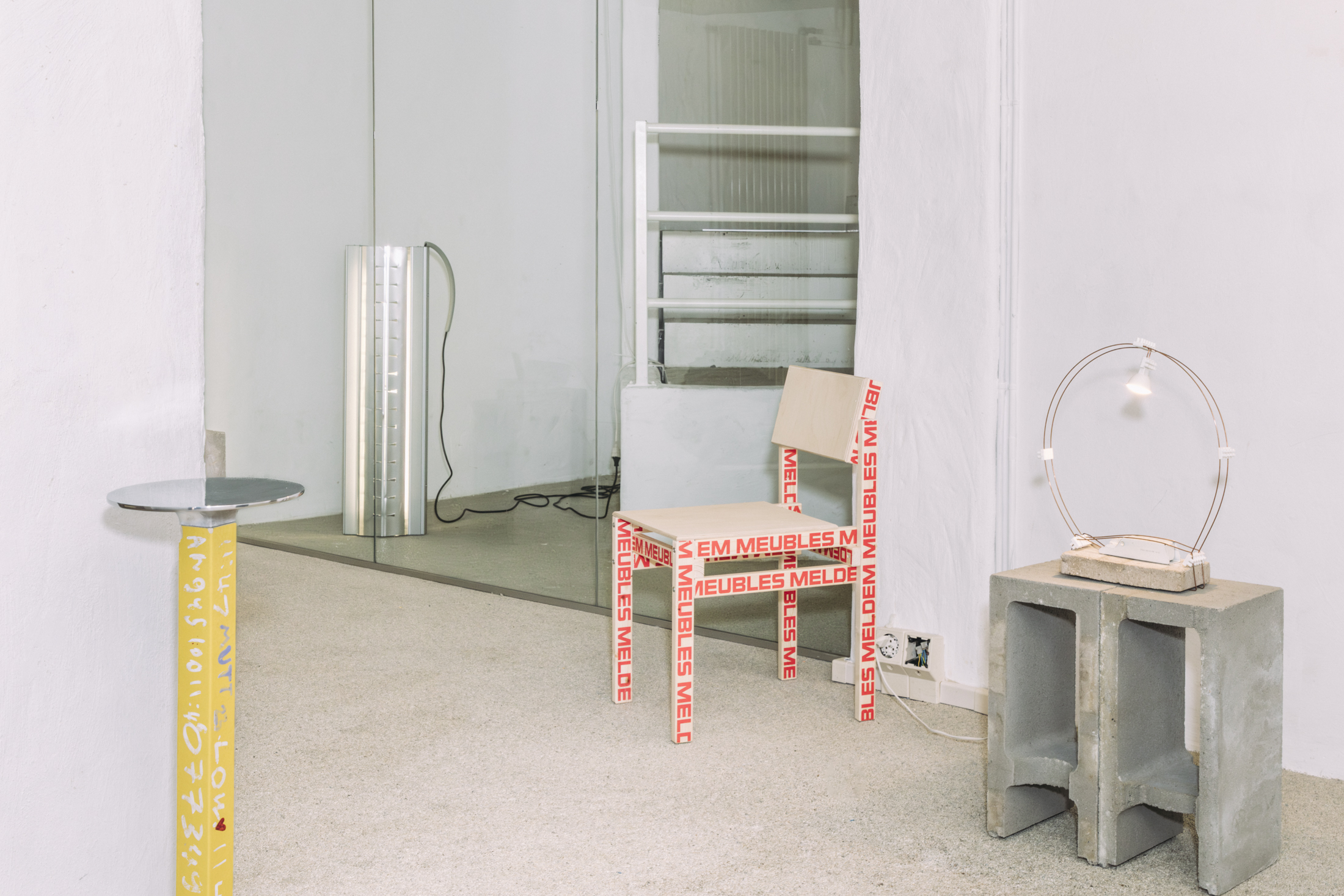 Alexandra Gerber, Standard Medium, Plinth, 2024; Pilz & HSZJN398 IDX26_v08, 2021Guy Meldem, Stackable Chair with Logo, 2025; Lucas Muñoz,B.A.R.E Series, ‘Small Circular’ Table Lamp