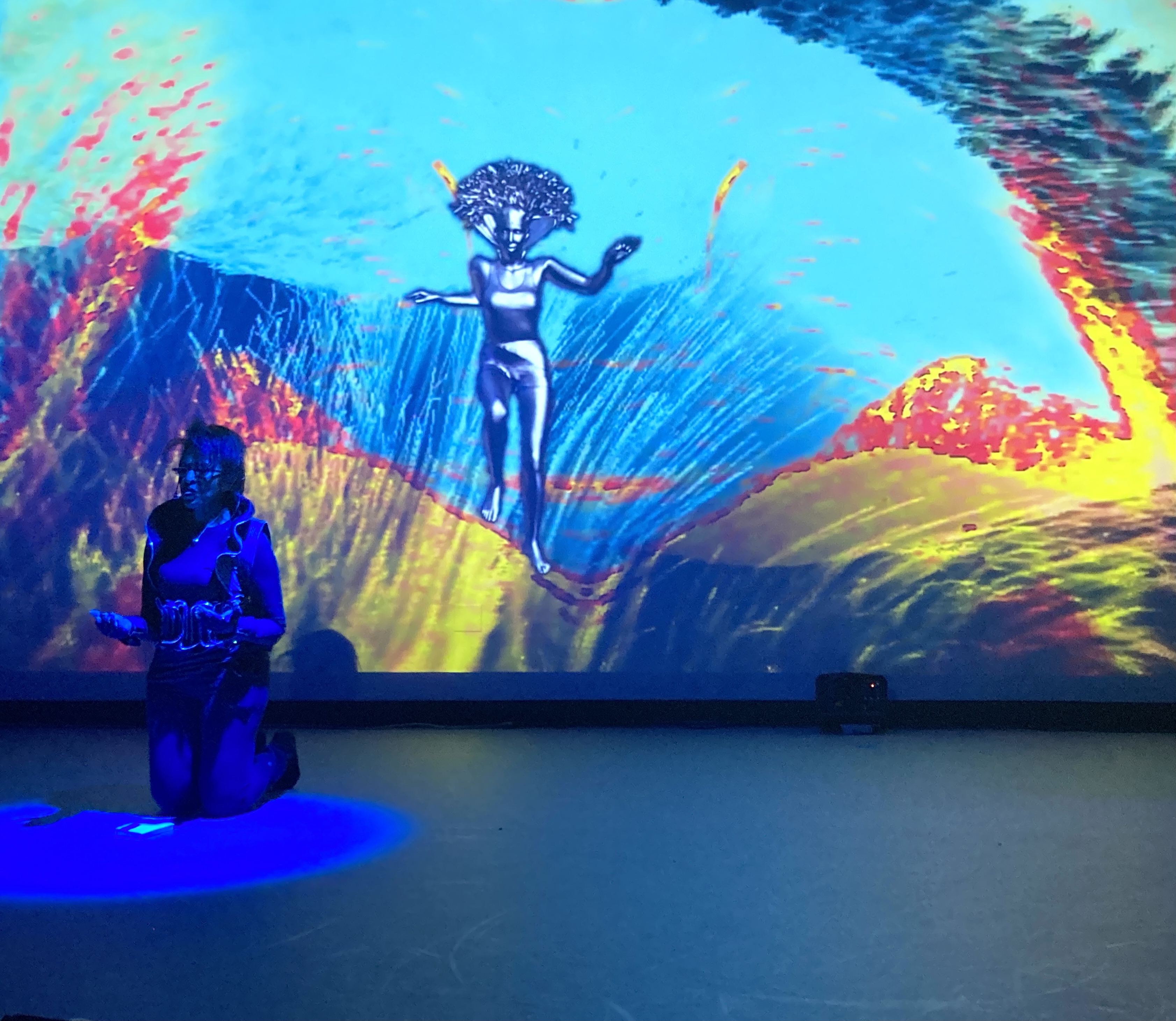 Nona Hendryx performing "Untethered" at the Movement Lab's work-in-progress show. Projected visuals by Allison Costa. Photo by Gabri Christa.