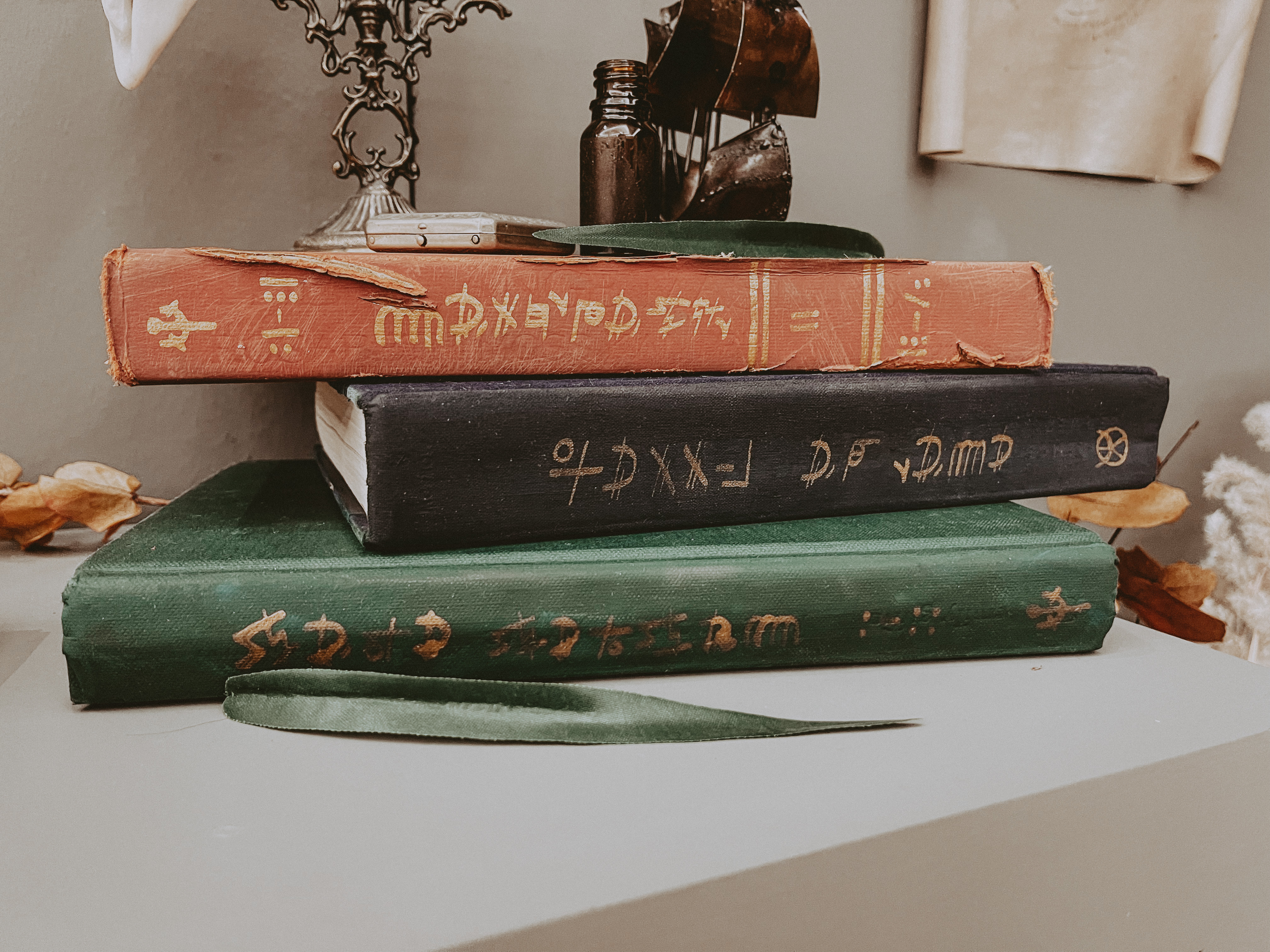 Each book in the display was painted, hand-distressed, and inked further to immerse the viewer into the world of Atlantis. 