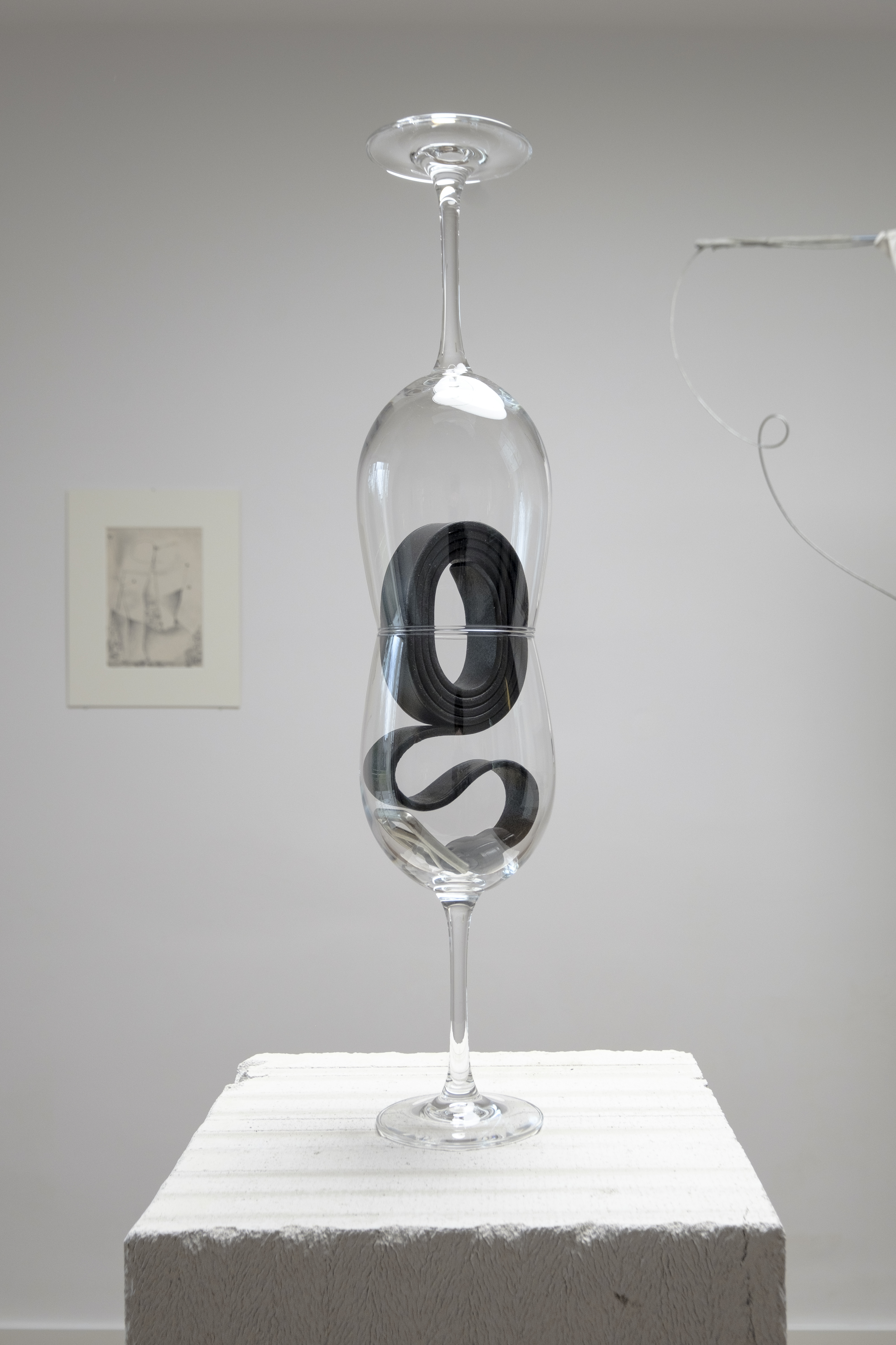Mutual Debt, 2022, Wineglasses, Leather belt. 49 x 9 x 9cm