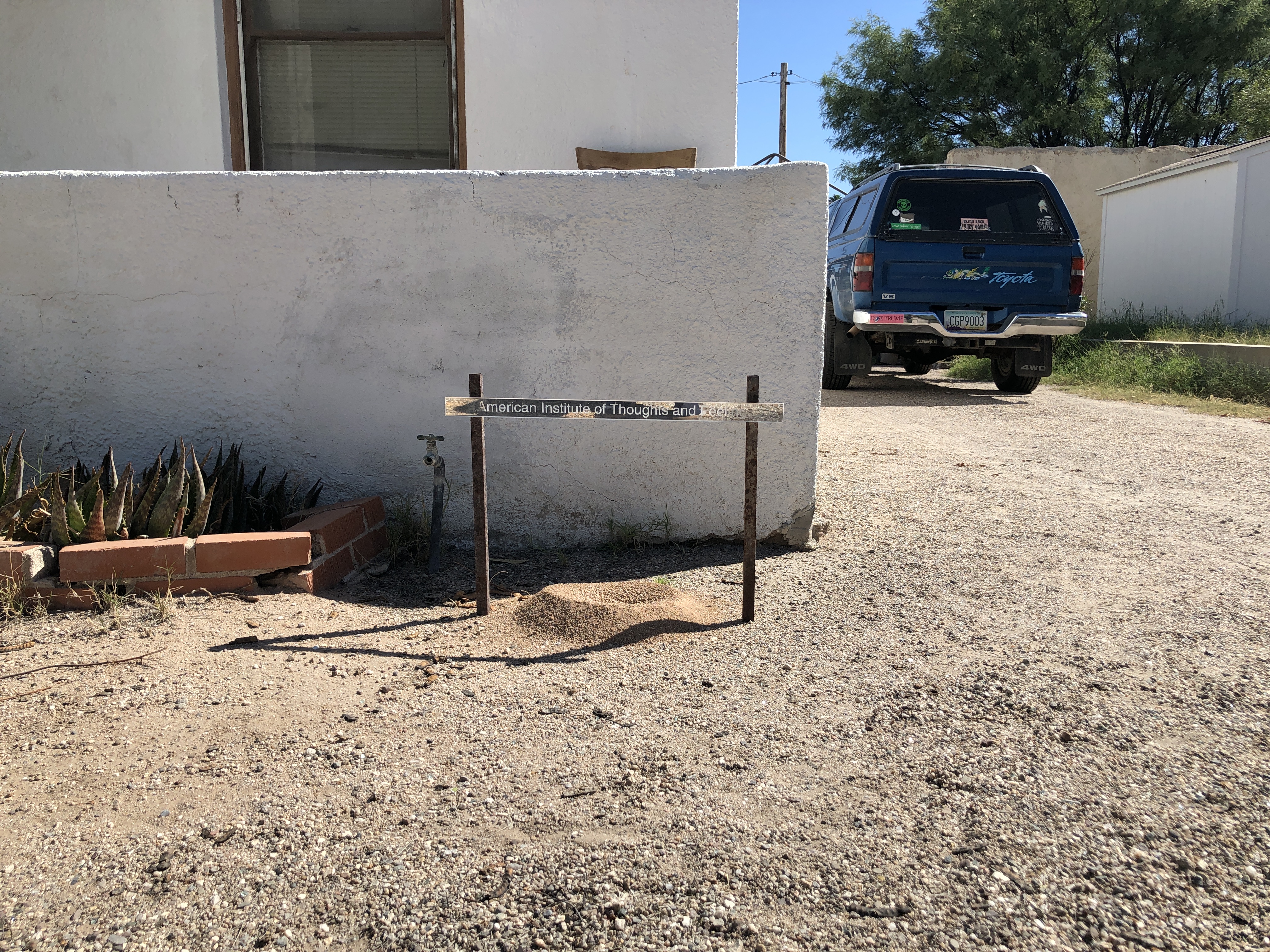 AITF yard sign with anthill.