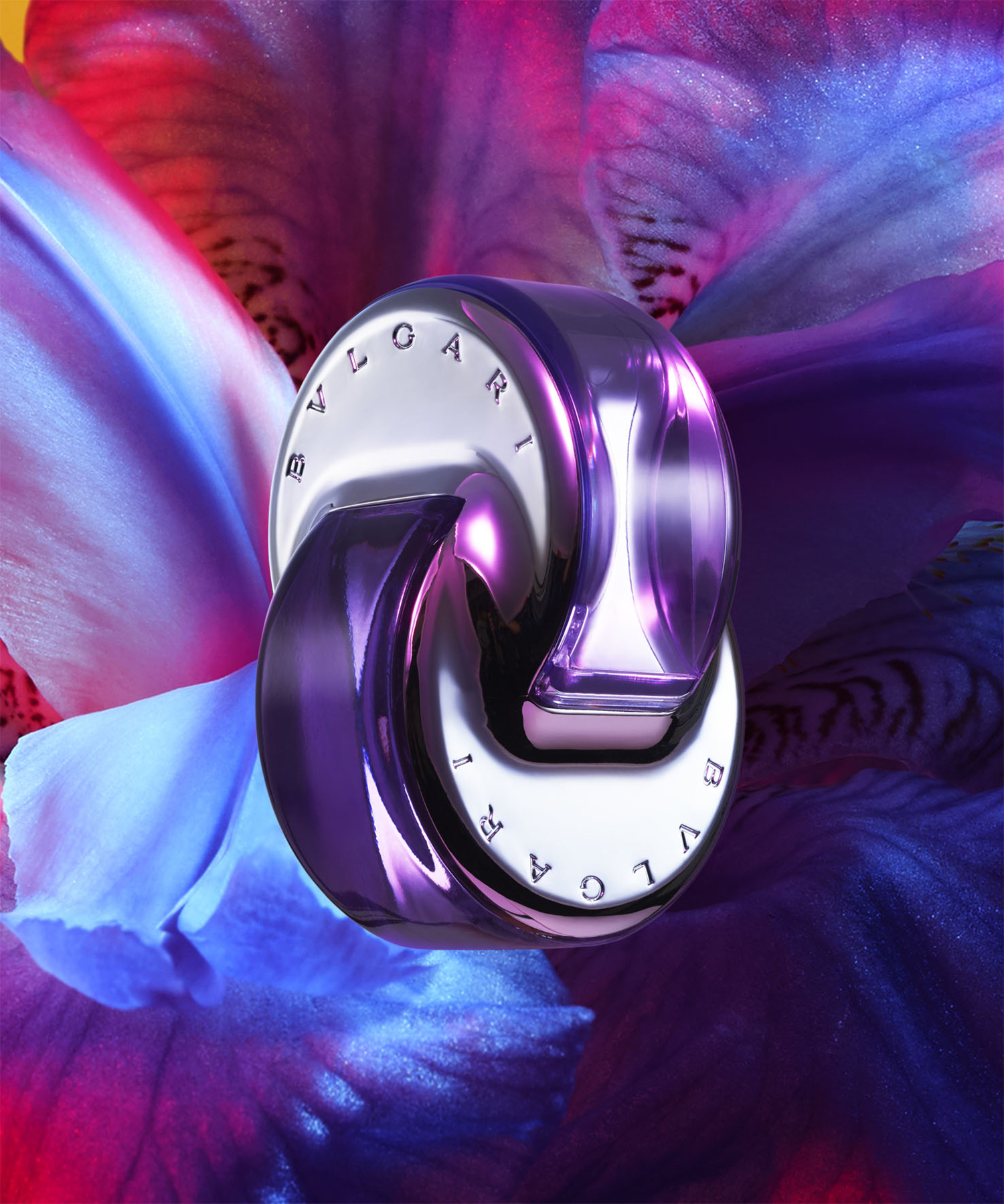 KMA photographer Daniel Schweizer photographs a photo of colorful rings for Bulgari with flowers in the background